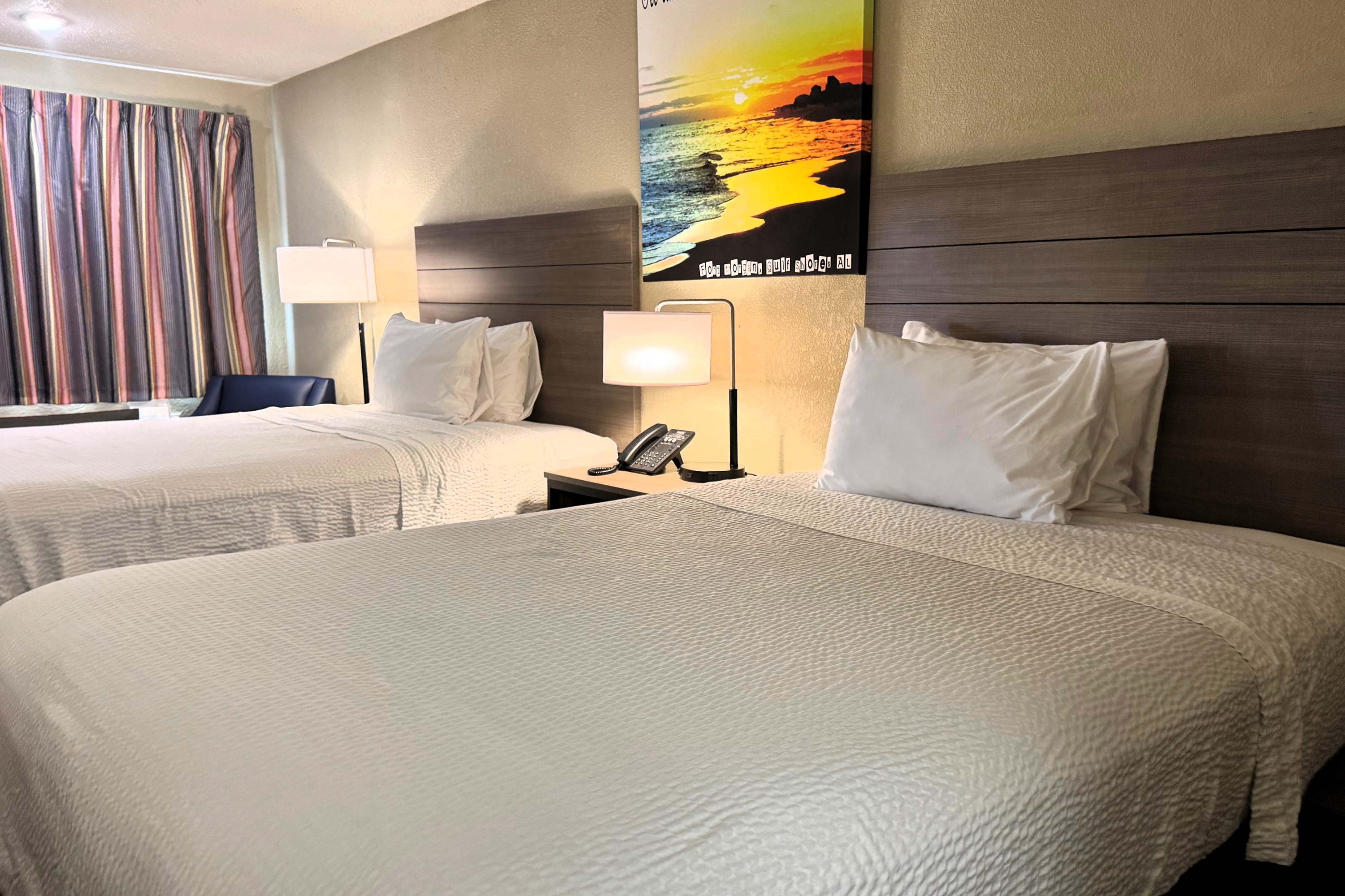 Guest room at the Travelodge by Wyndham Thomasville AL in Thomasville, Alabama
