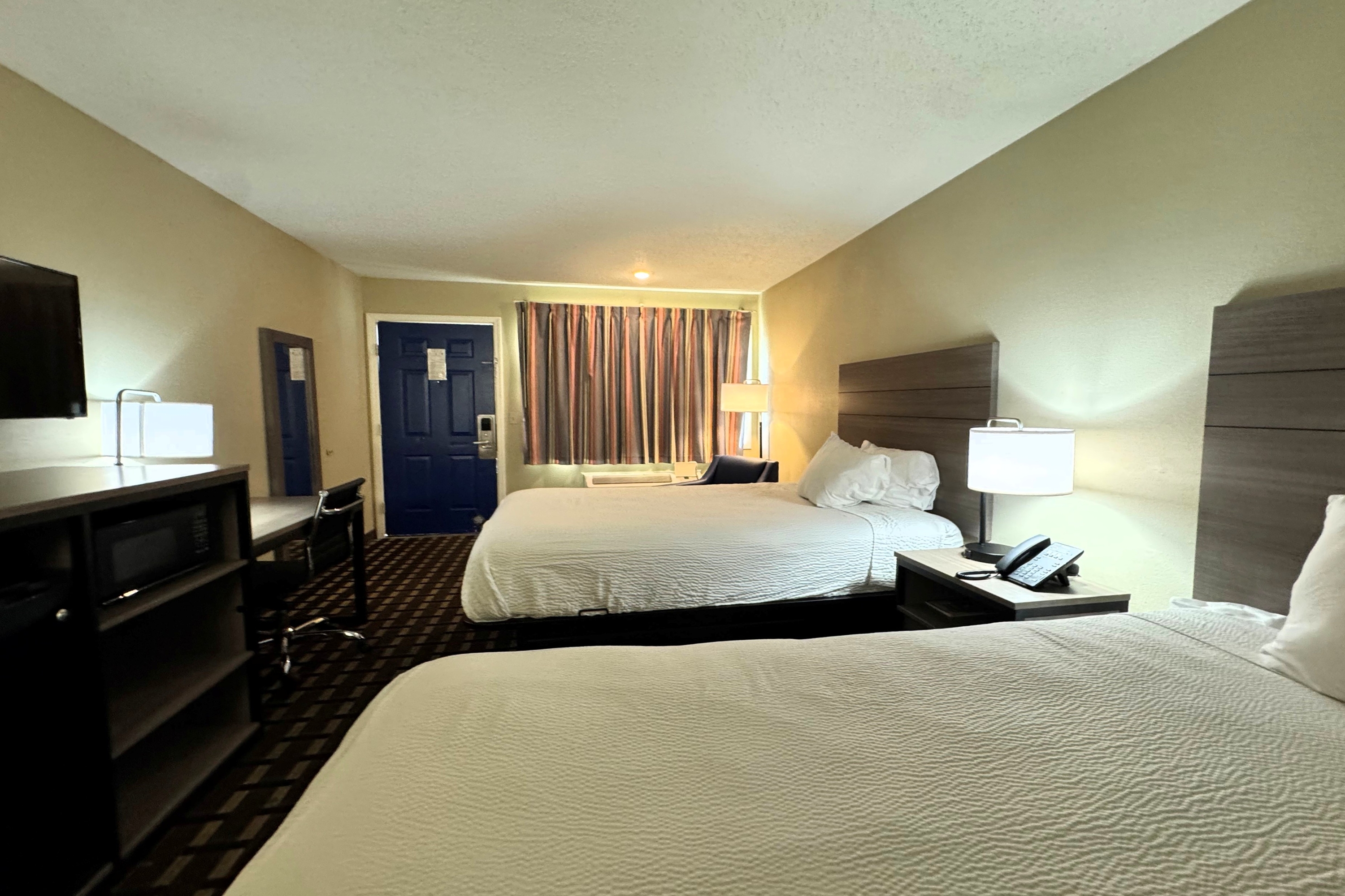 Guest room at the Travelodge by Wyndham Thomasville AL in Thomasville, Alabama
