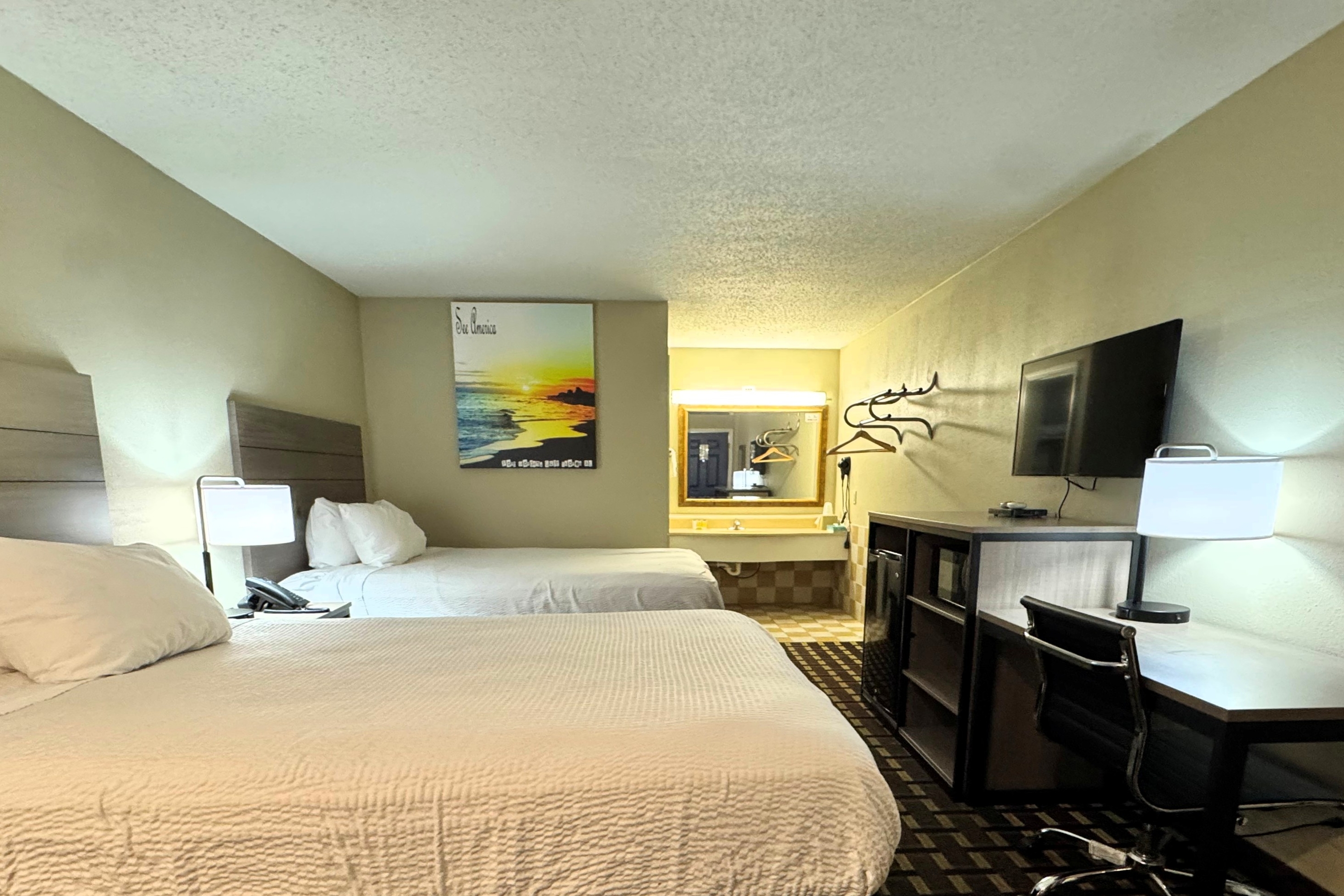 Guest room at the Travelodge by Wyndham Thomasville AL in Thomasville, Alabama