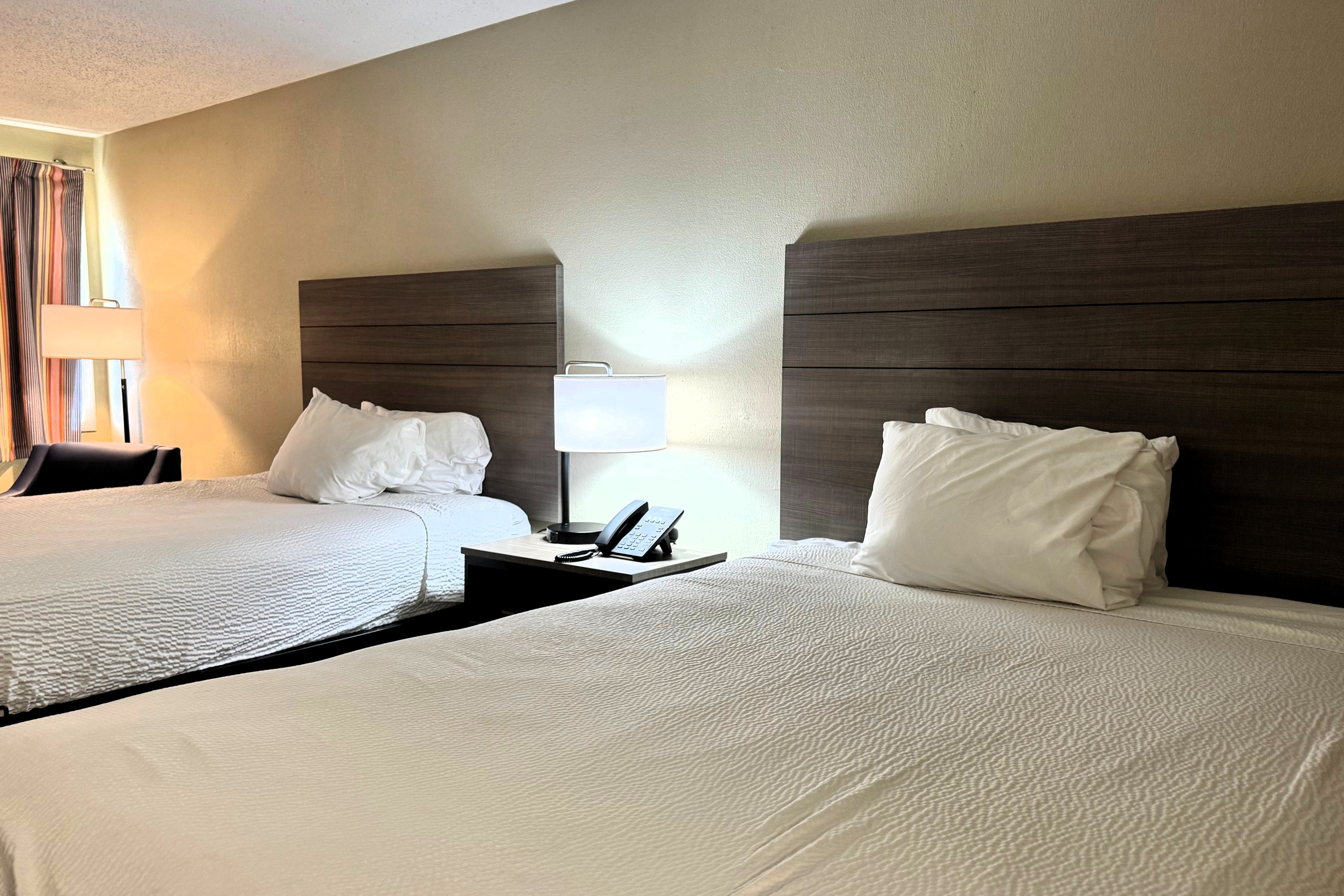 Guest room at the Travelodge by Wyndham Thomasville AL in Thomasville, Alabama