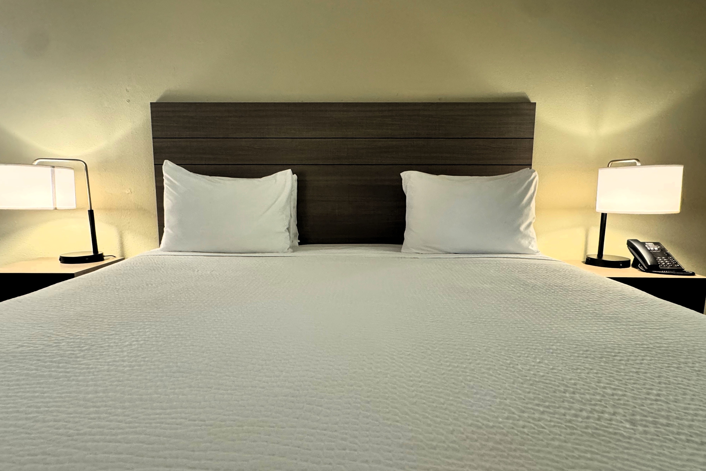 Guest room at the Travelodge by Wyndham Thomasville AL in Thomasville, Alabama