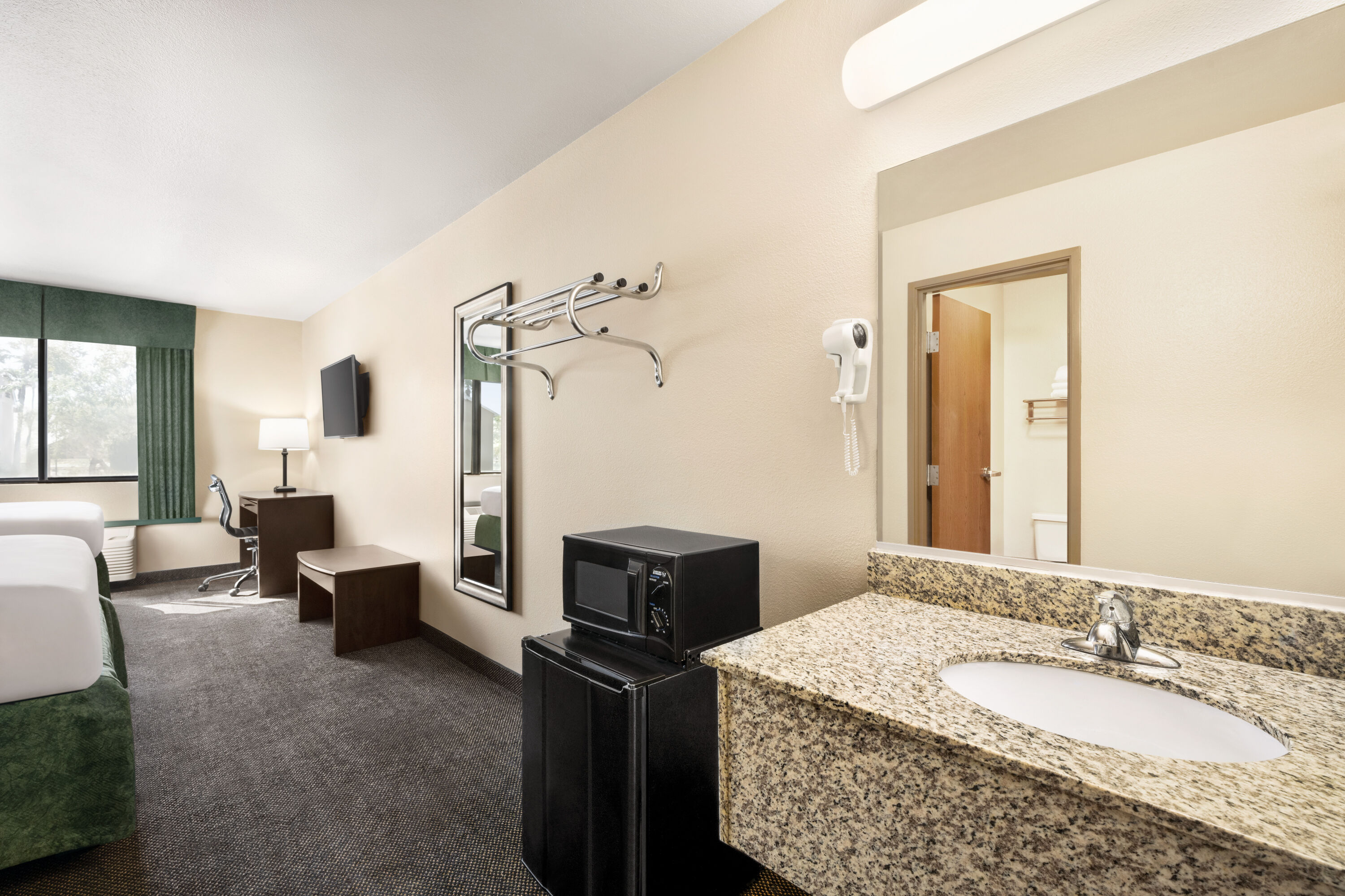 Guest room at the Travelodge by Wyndham Yuma in Yuma, Arizona