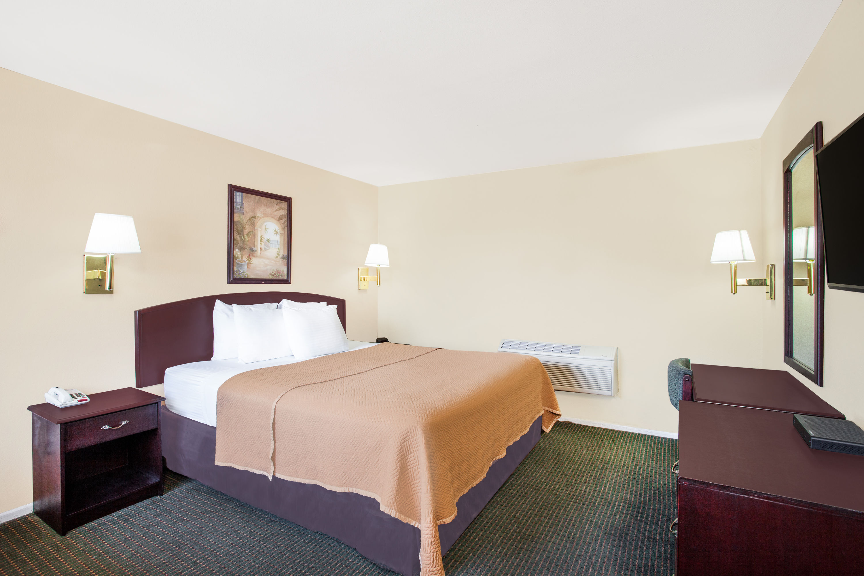Guest room at the Travelodge by Wyndham Barstow in Barstow, California