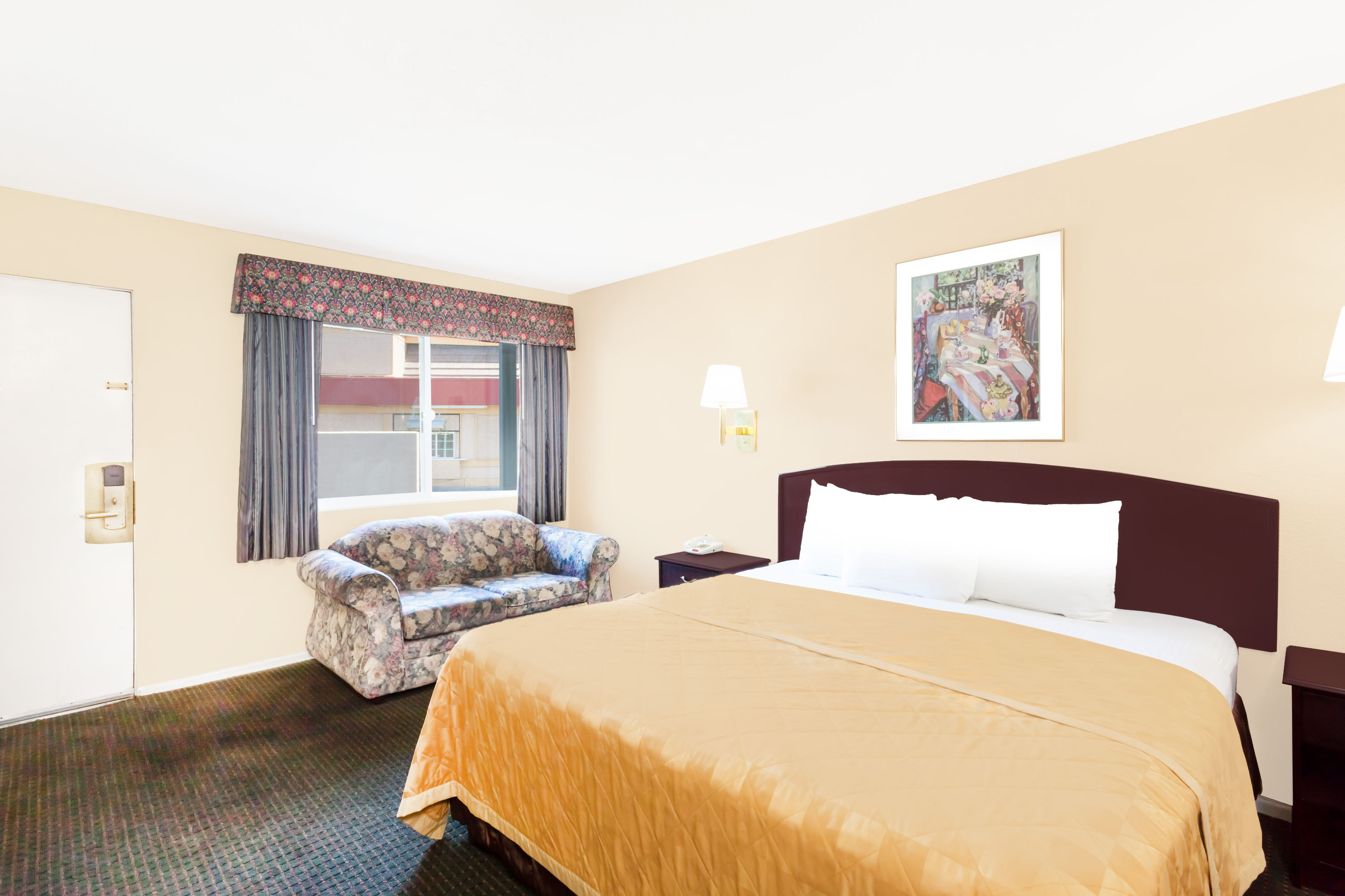 Guest room at the Travelodge by Wyndham Barstow in Barstow, California