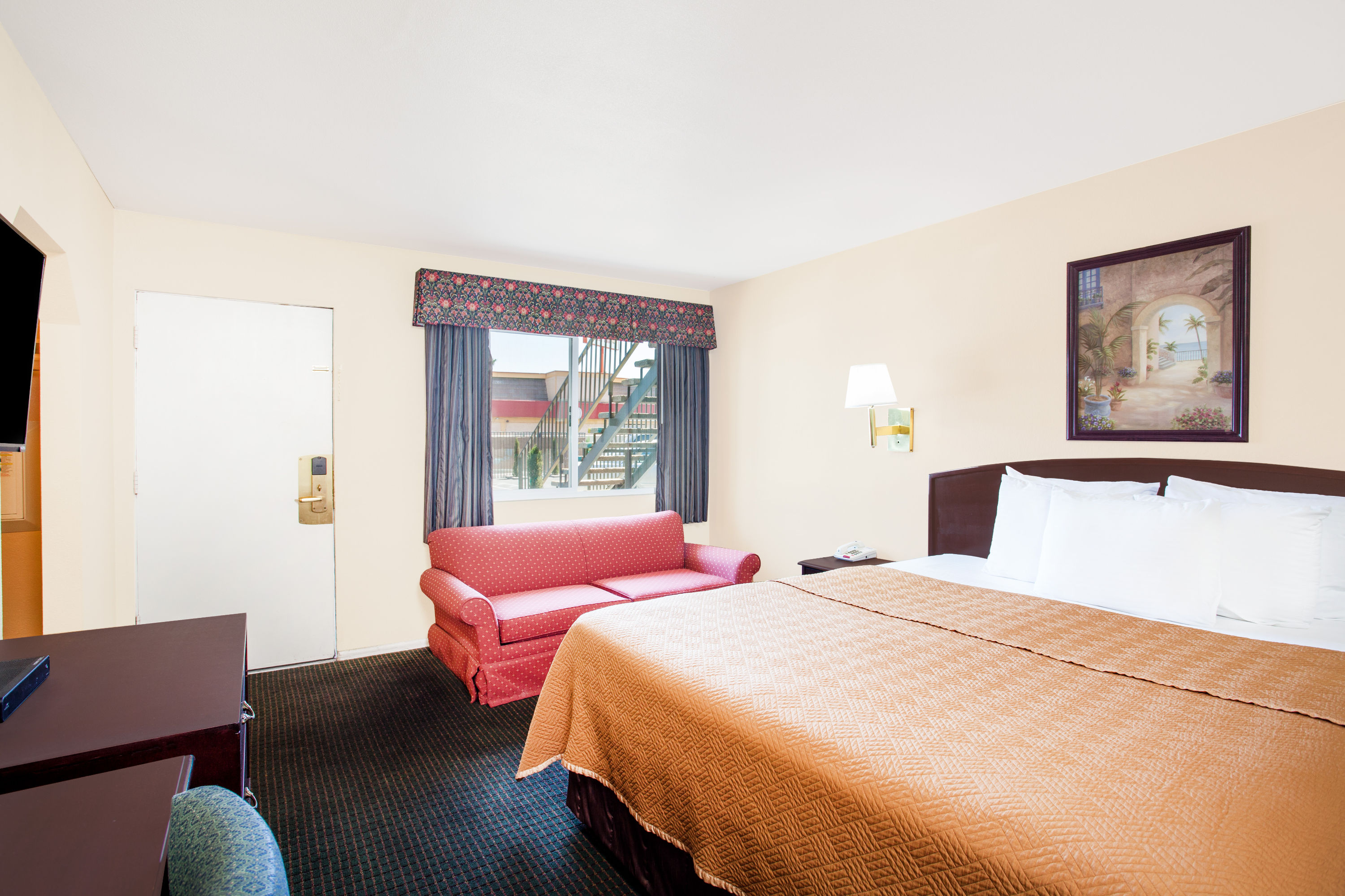 Guest room at the Travelodge by Wyndham Barstow in Barstow, California