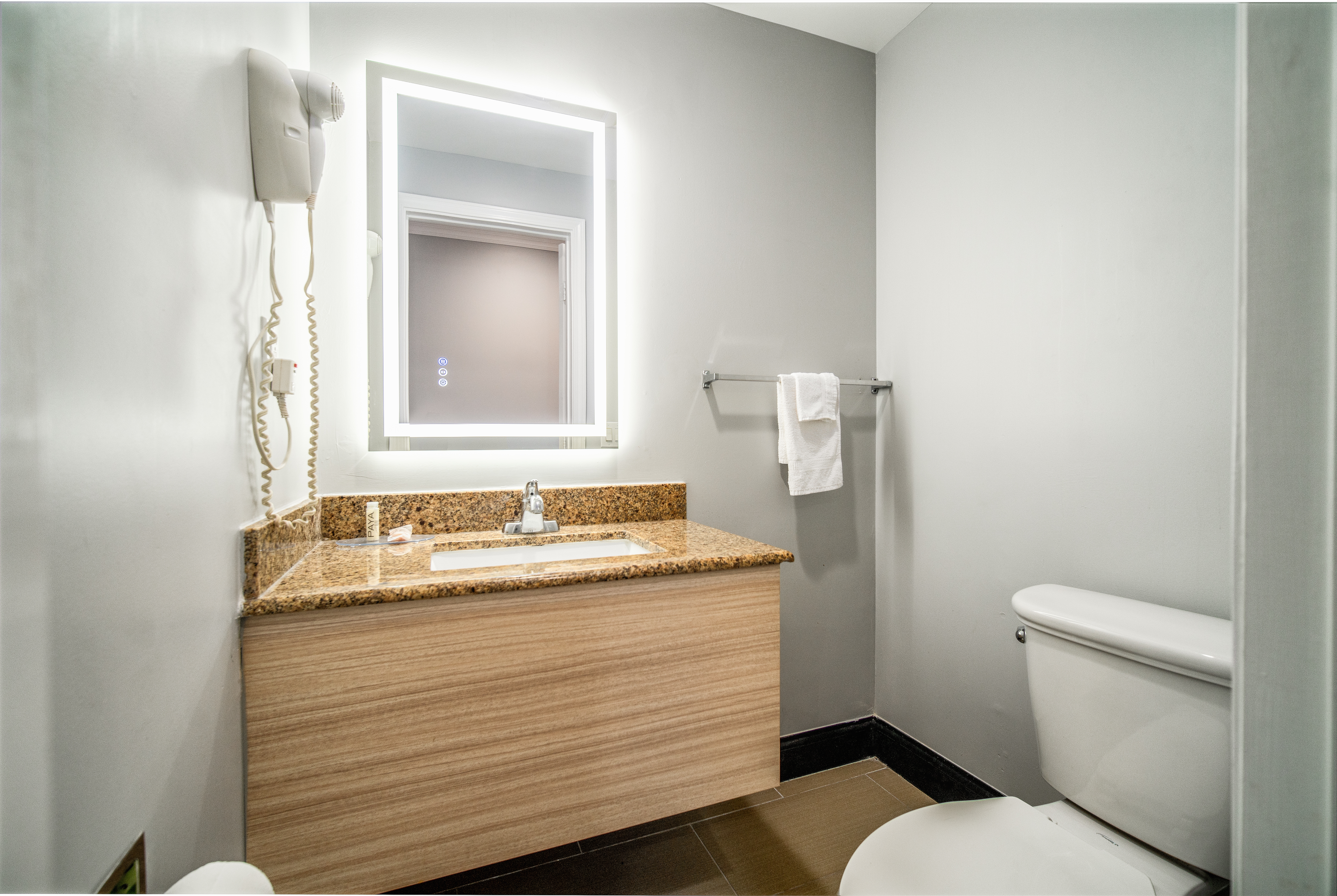 Guest room bath at the Travelodge Inn & Suites by Wyndham Bell Los Angeles Area in Bell, California