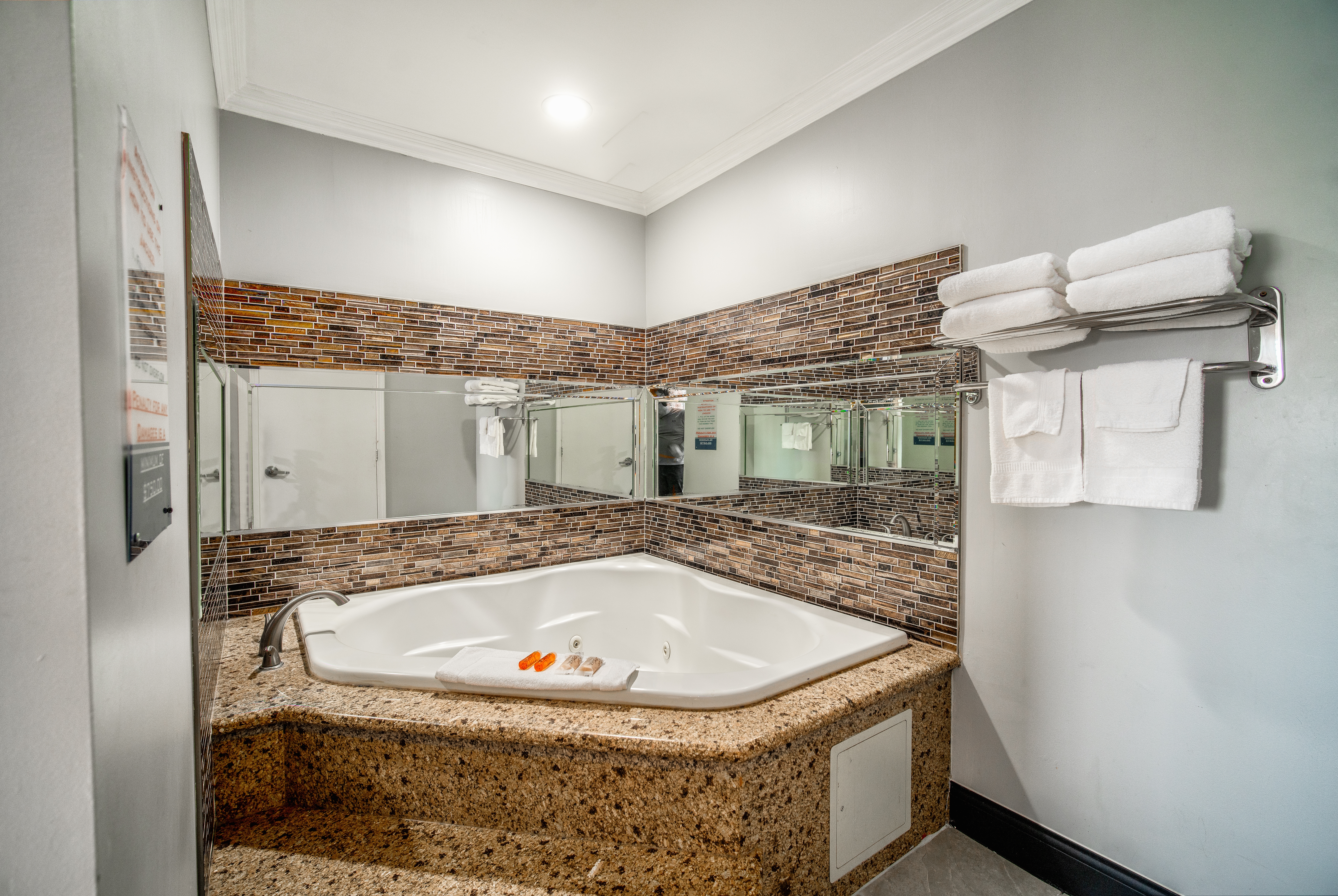 Guest room bath at the Travelodge Inn & Suites by Wyndham Bell Los Angeles Area in Bell, California