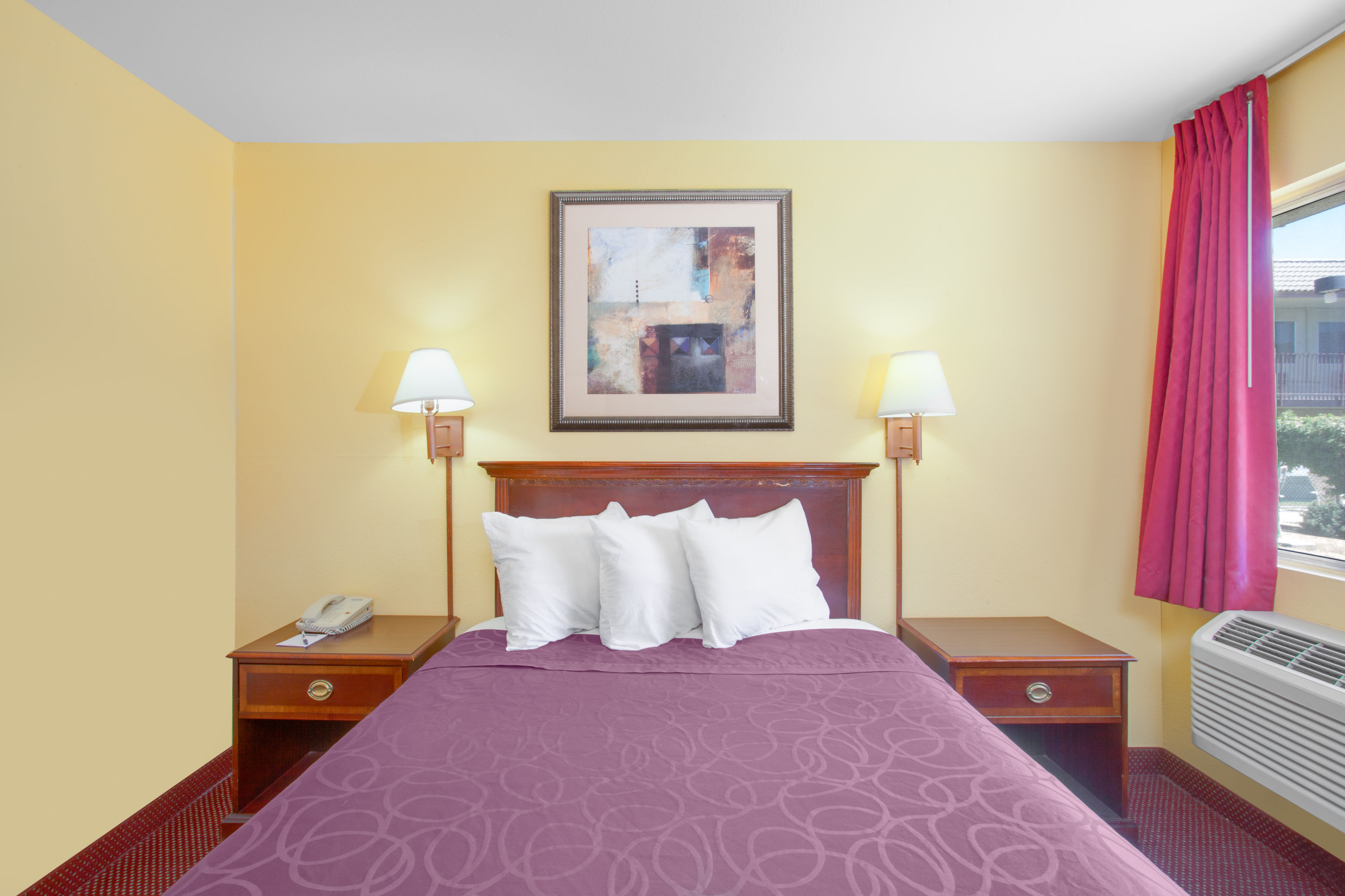 Guest room at the Travelodge by Wyndham Coalinga in Coalinga, California