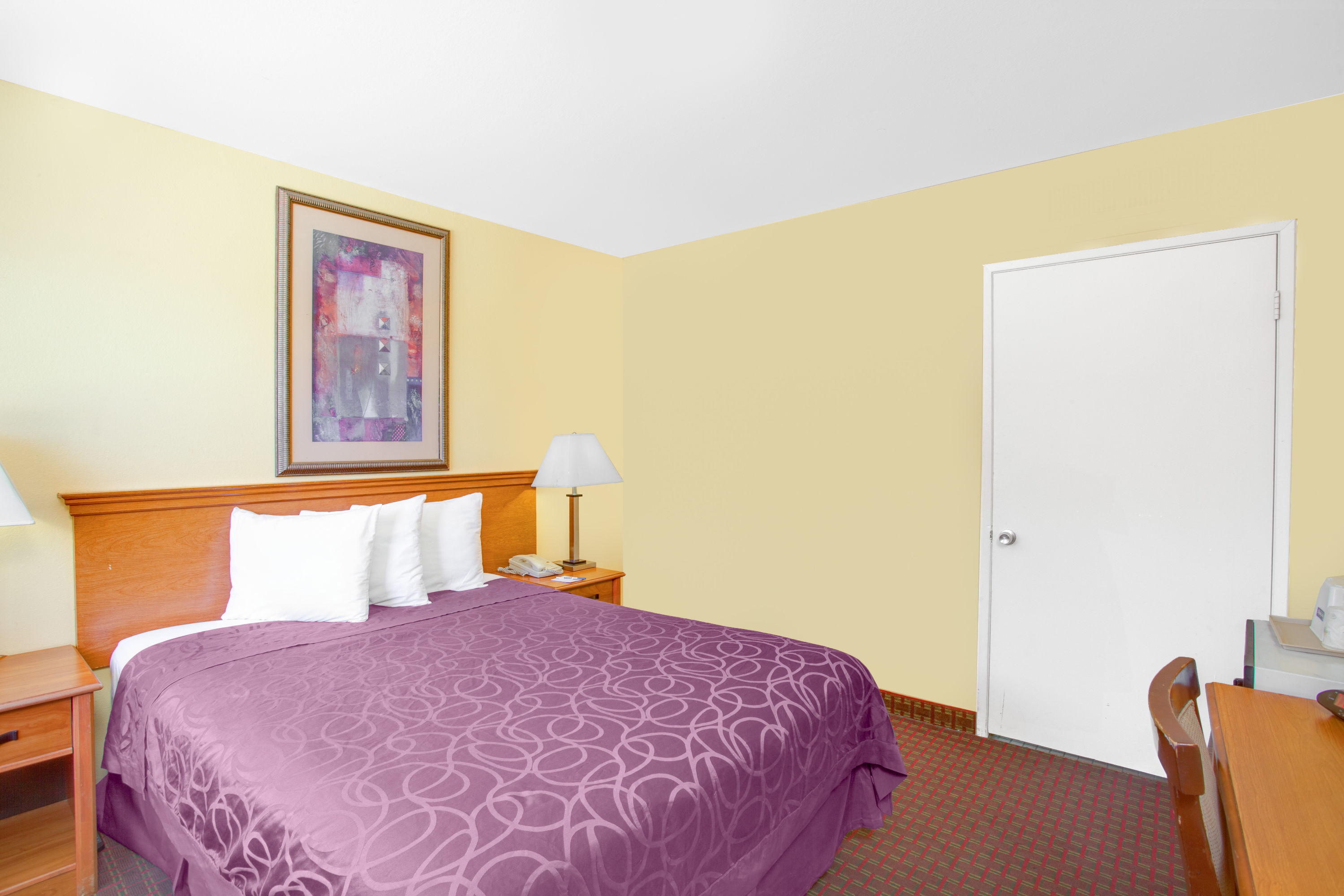 Guest room at the Travelodge by Wyndham Coalinga in Coalinga, California