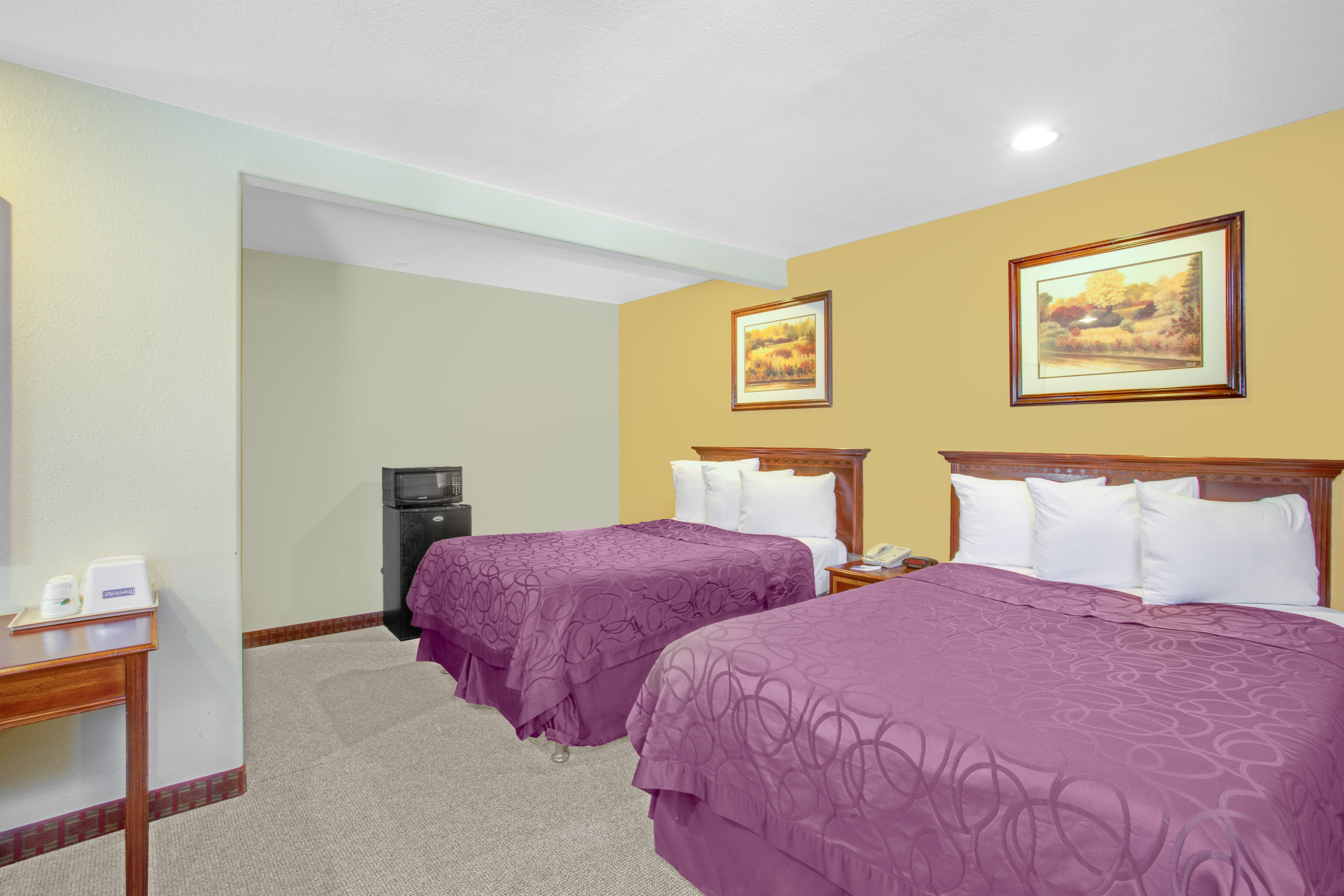 Guest room at the Travelodge by Wyndham Coalinga in Coalinga, California