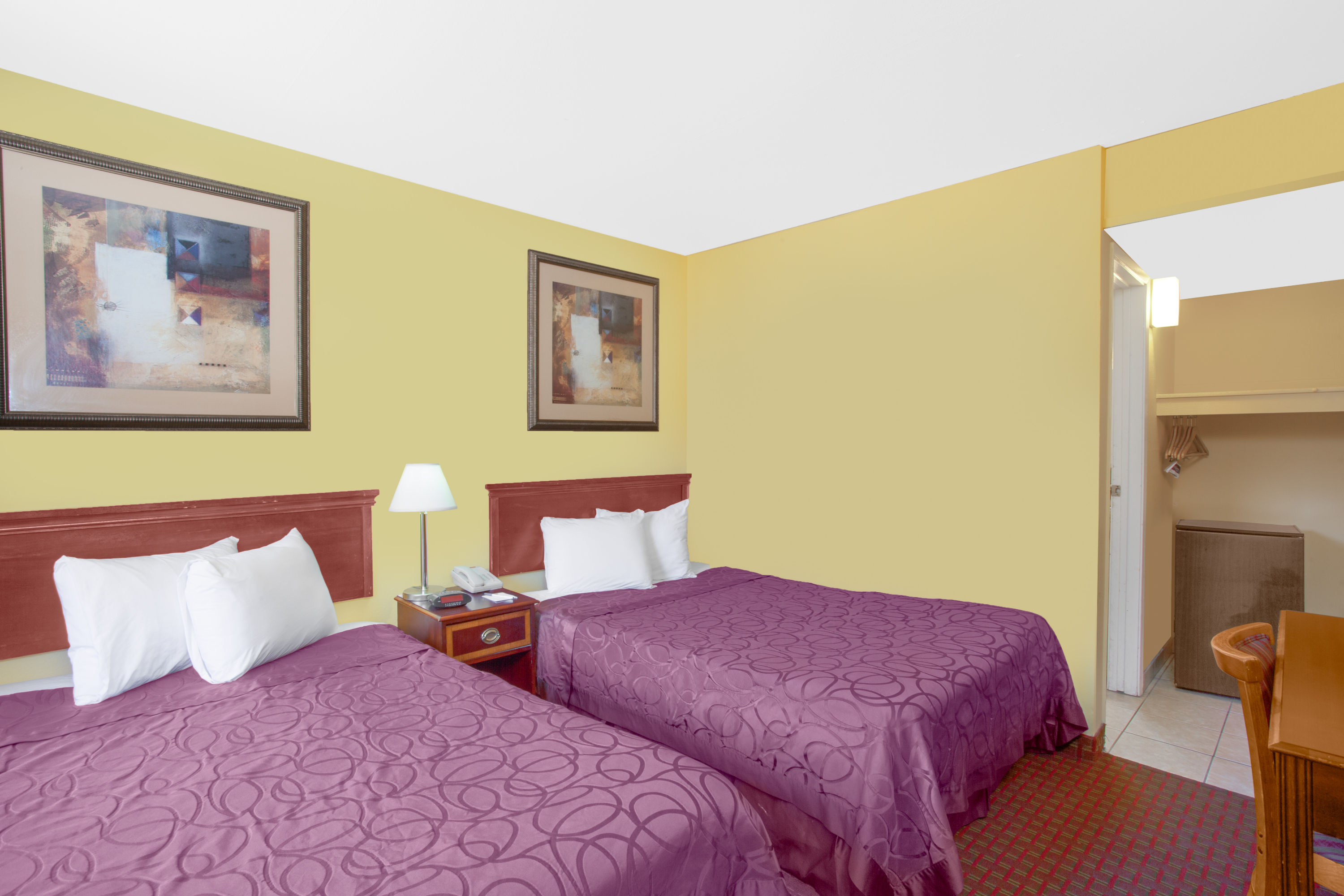 Guest room at the Travelodge by Wyndham Coalinga in Coalinga, California