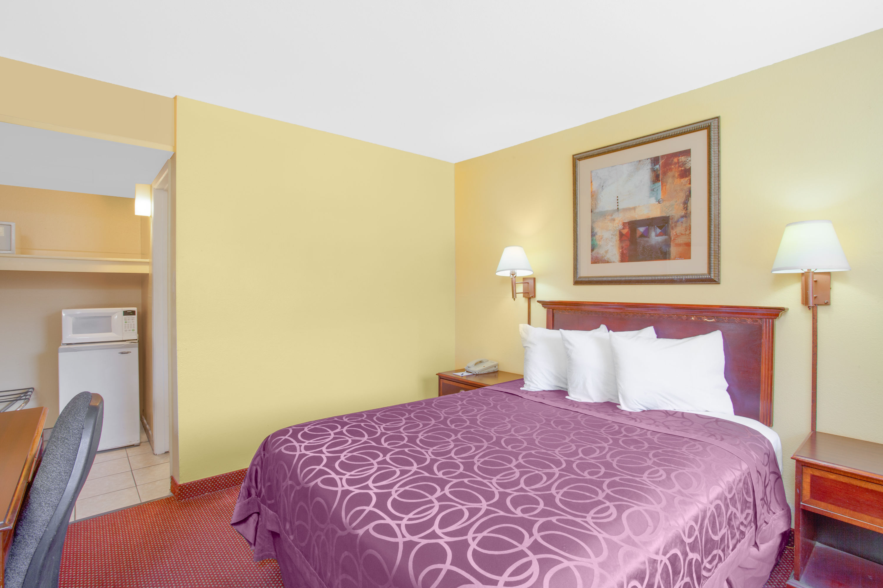 Guest room at the Travelodge by Wyndham Coalinga in Coalinga, California