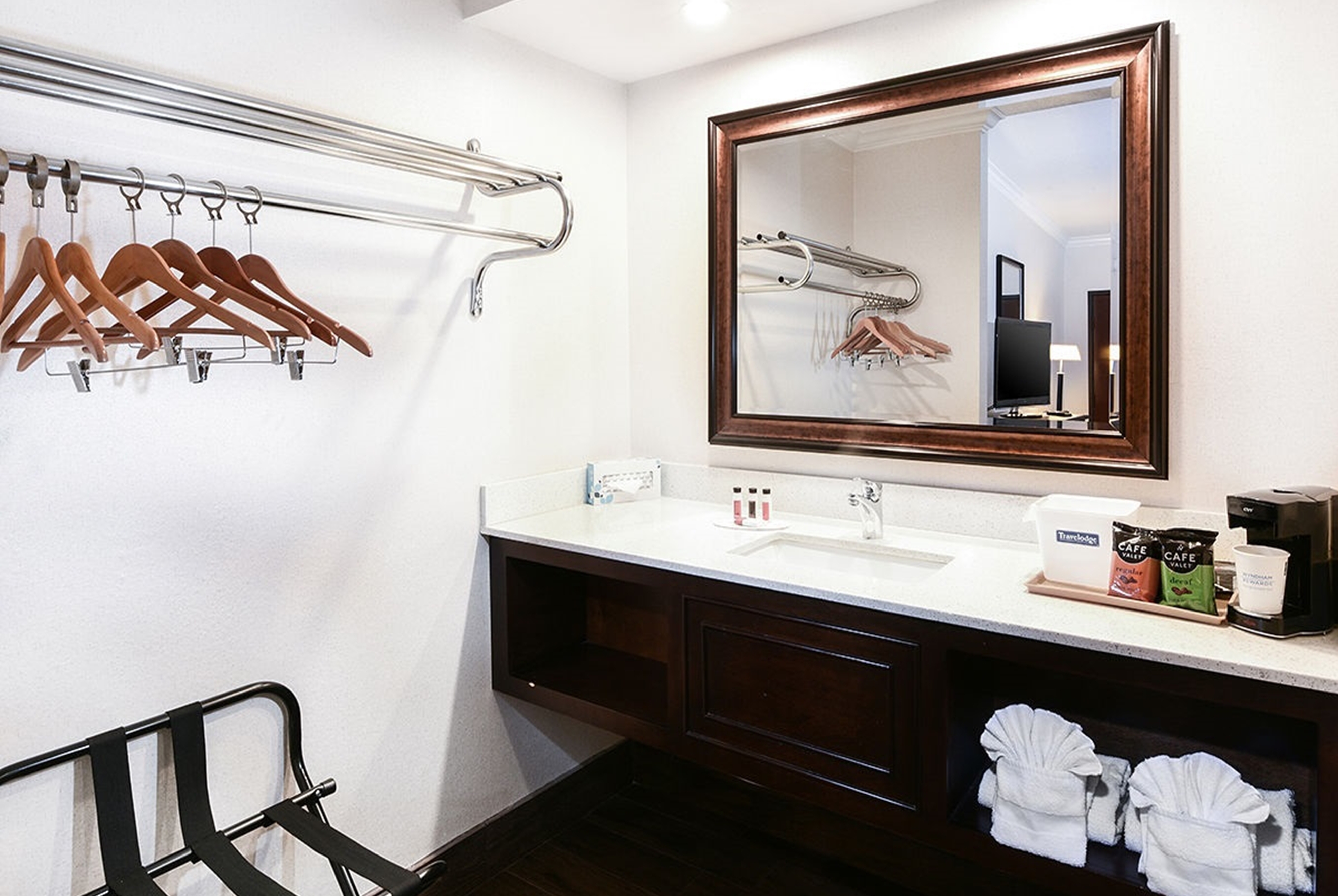 Guest room bath at the Travelodge by Wyndham Commerce Los Angeles Area in Commerce, California