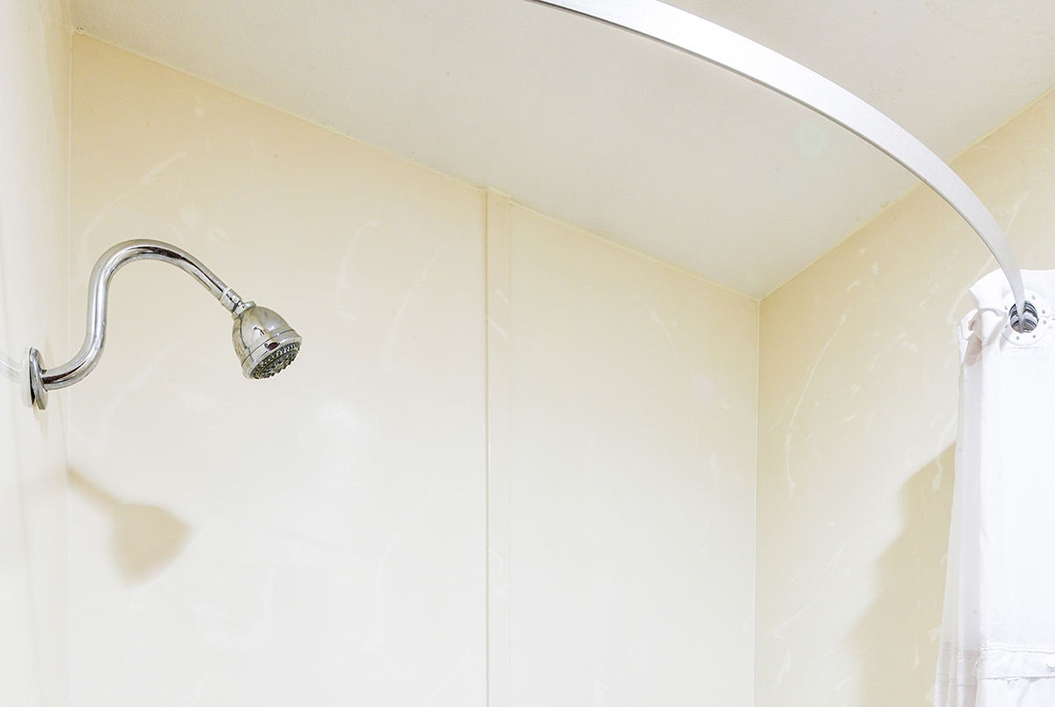 Guest room bath at the Travelodge by Wyndham Commerce Los Angeles Area in Commerce, California