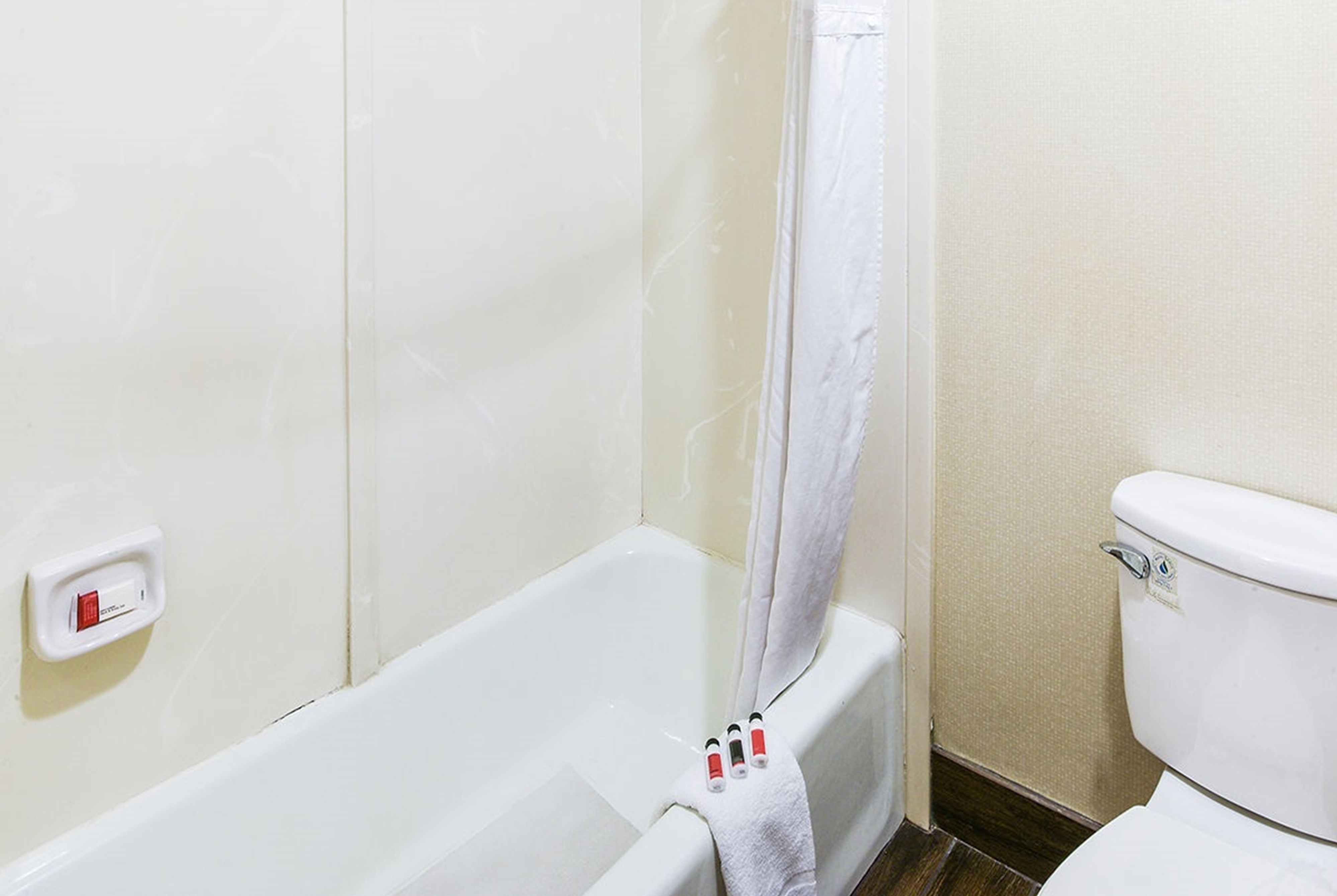 Guest room bath at the Travelodge by Wyndham Commerce Los Angeles Area in Commerce, California