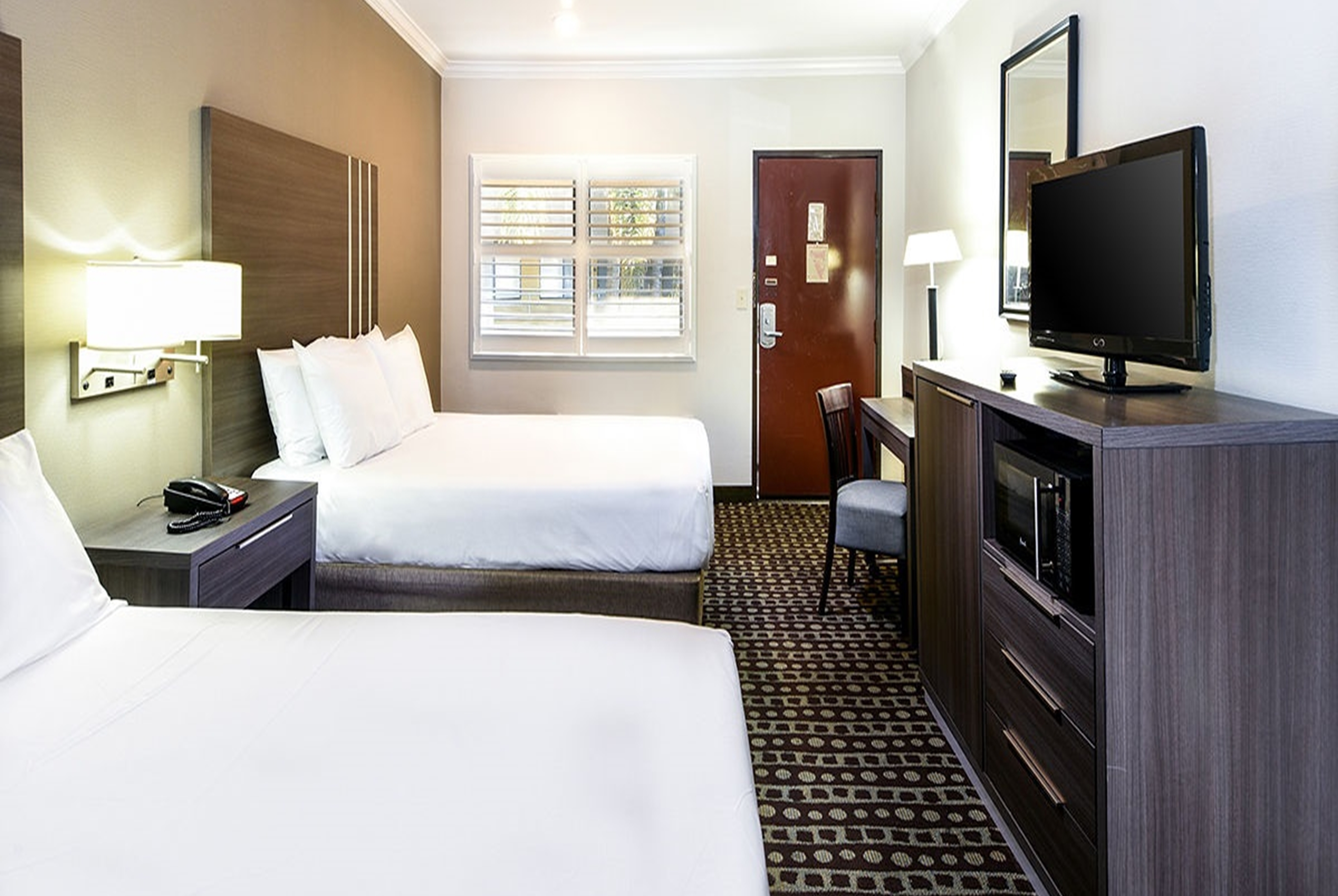 Guest room at the Travelodge by Wyndham Commerce Los Angeles Area in Commerce, California