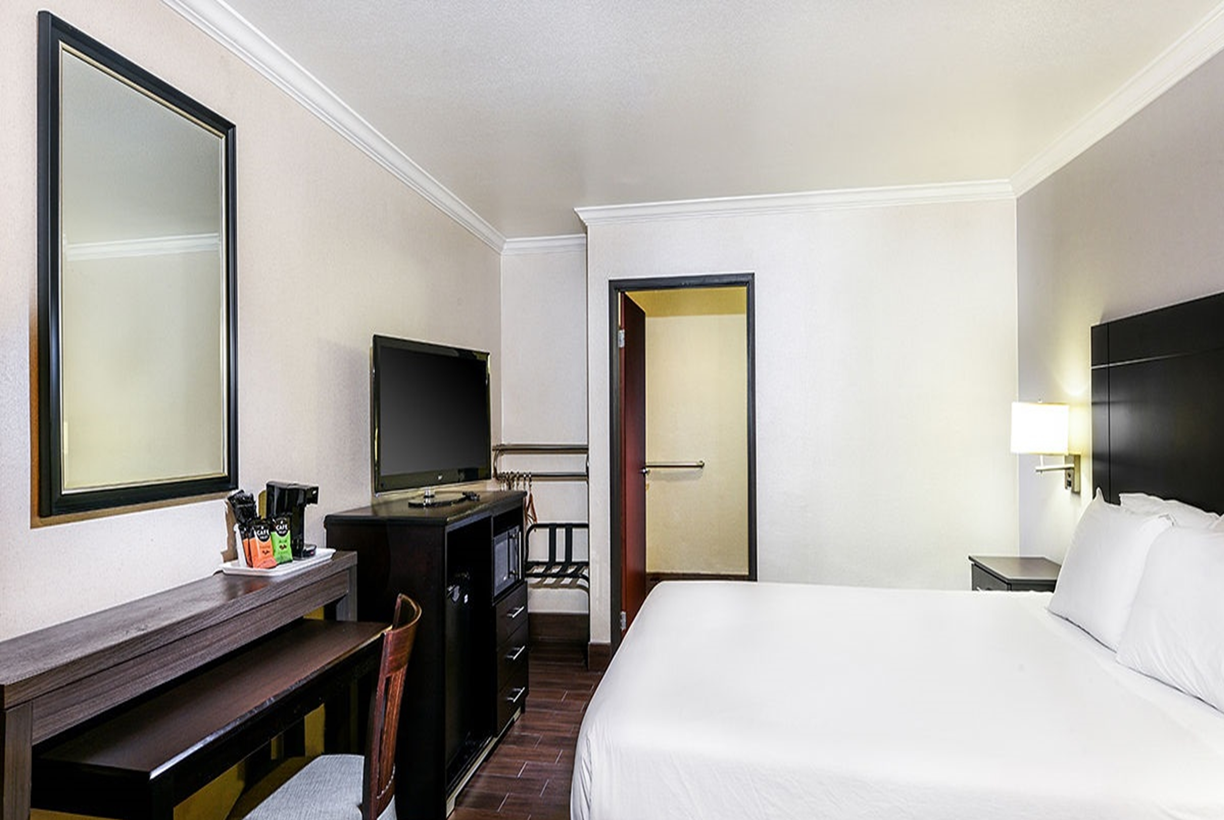 Guest room at the Travelodge by Wyndham Commerce Los Angeles Area in Commerce, California