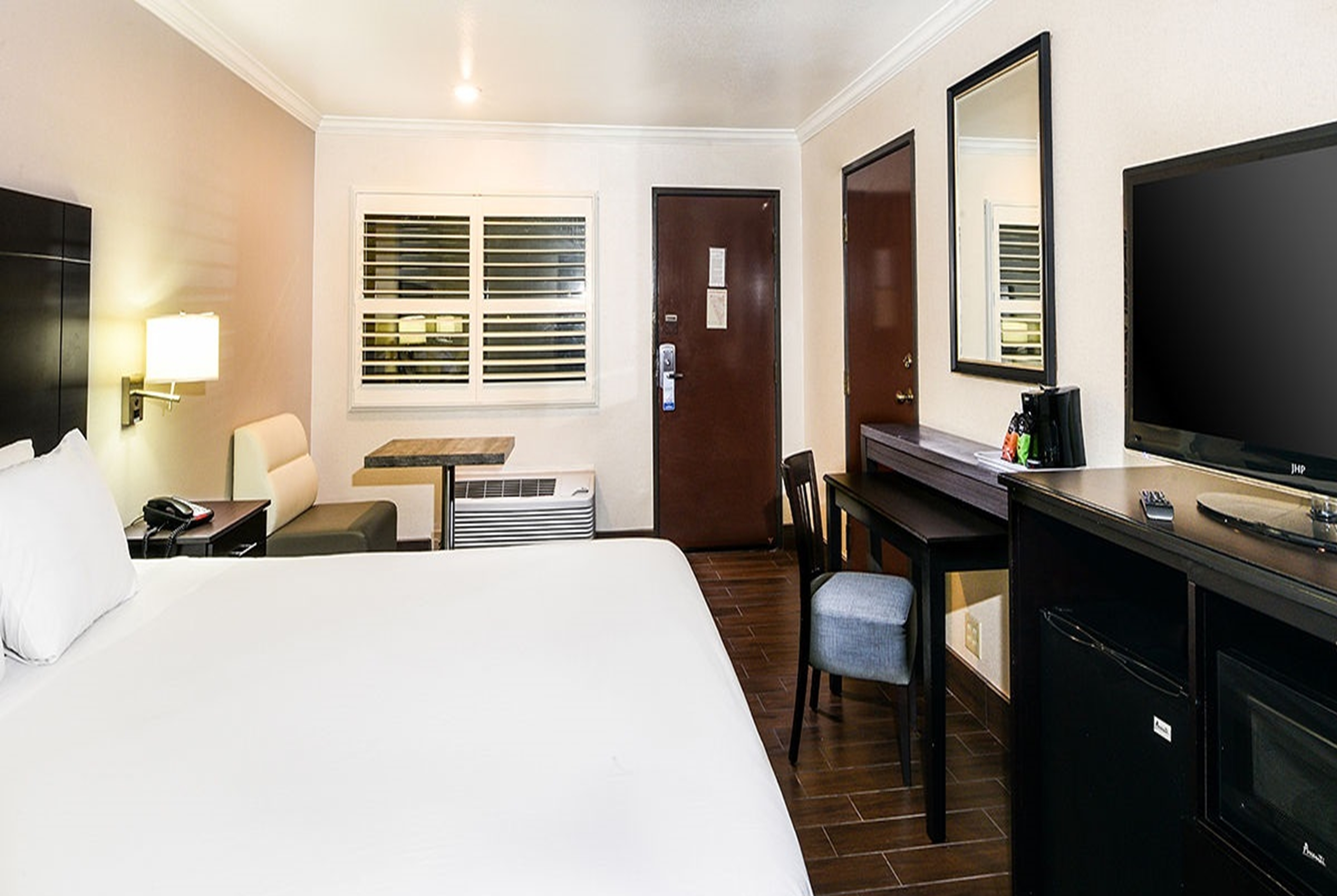 Guest room at the Travelodge by Wyndham Commerce Los Angeles Area in Commerce, California