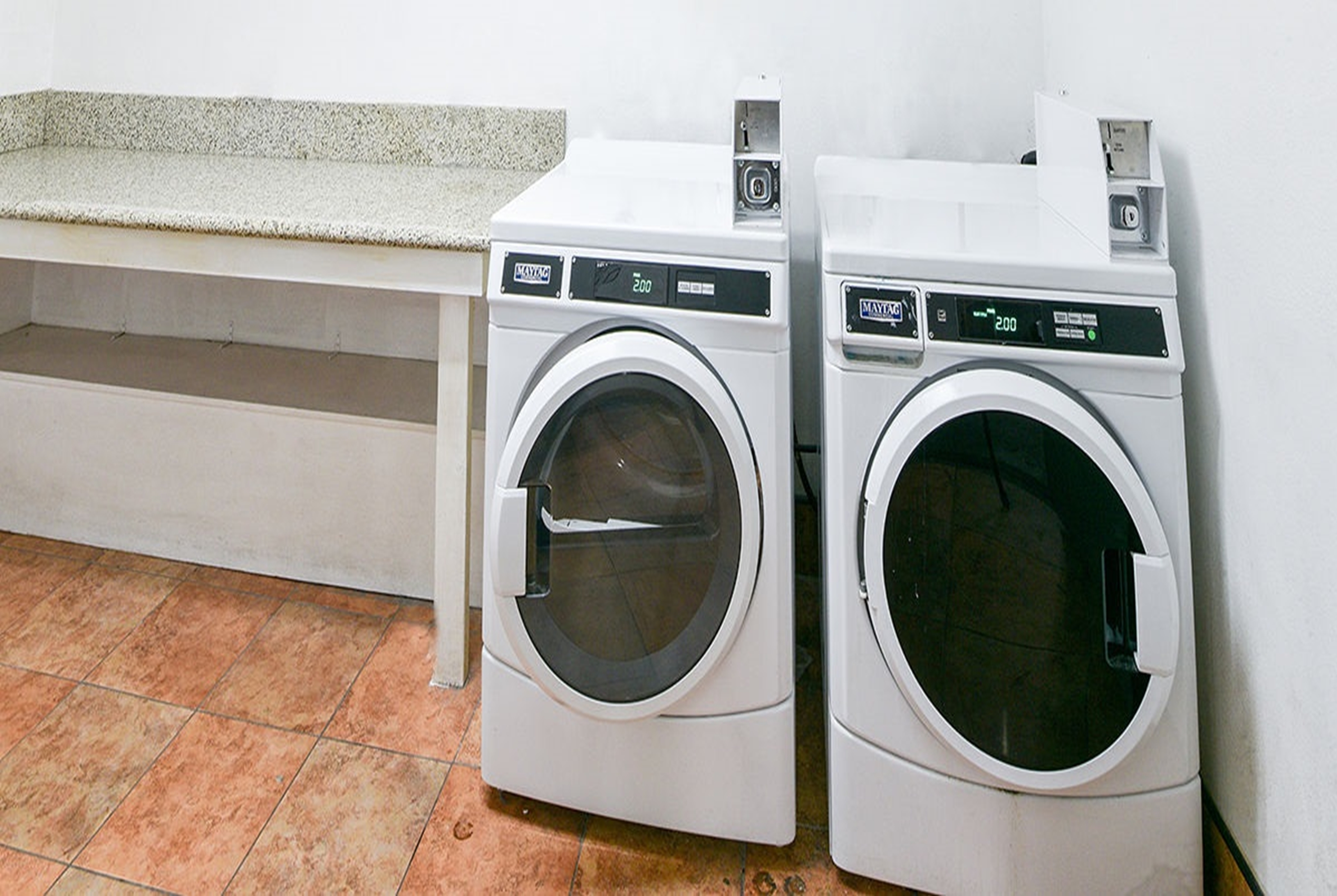 Laundry facilities at Travelodge by Wyndham Commerce Los Angeles Area in Commerce, California