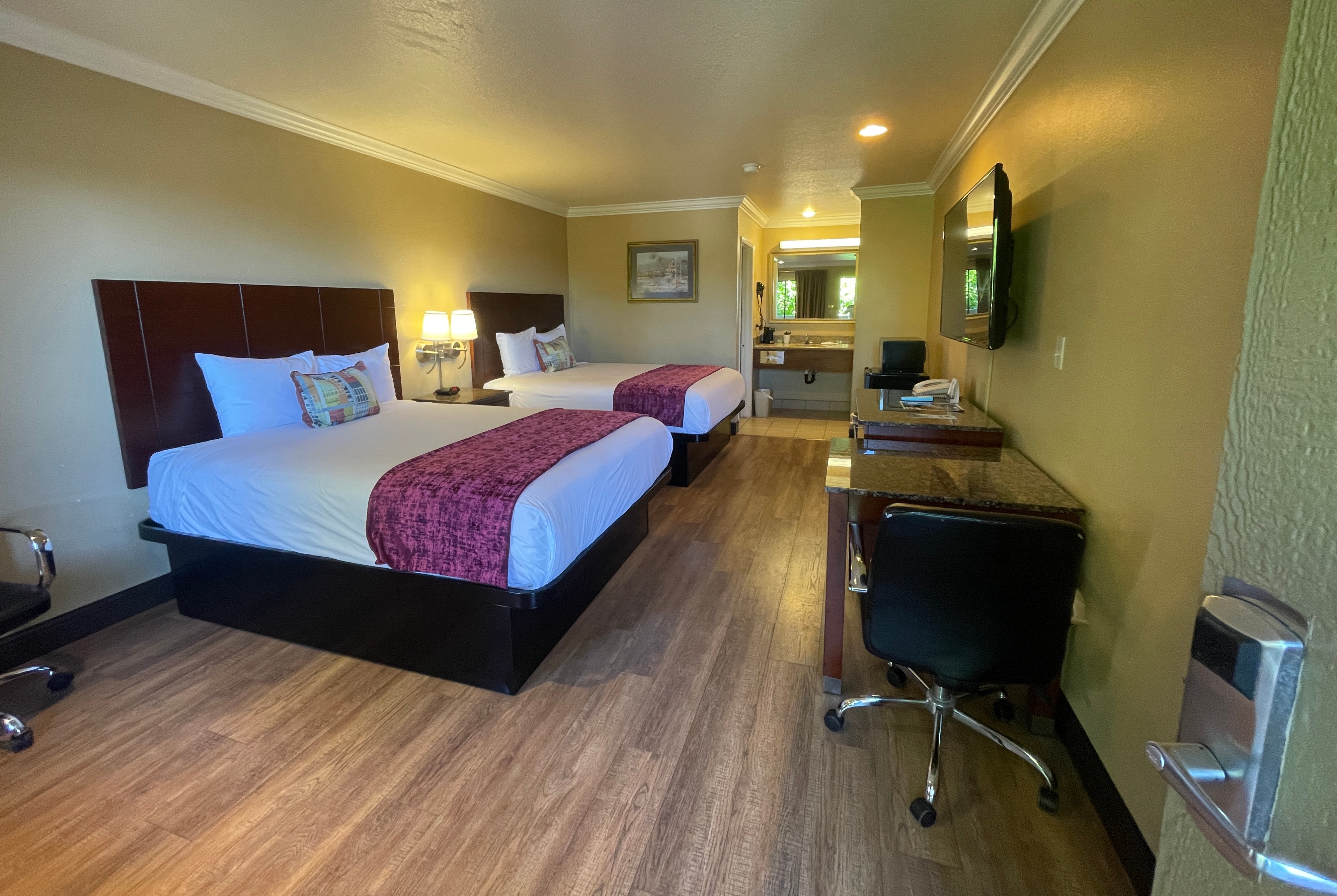 Guest room at the Travelodge by Wyndham Costa Mesa Newport Beach Hacienda in Costa Mesa, California