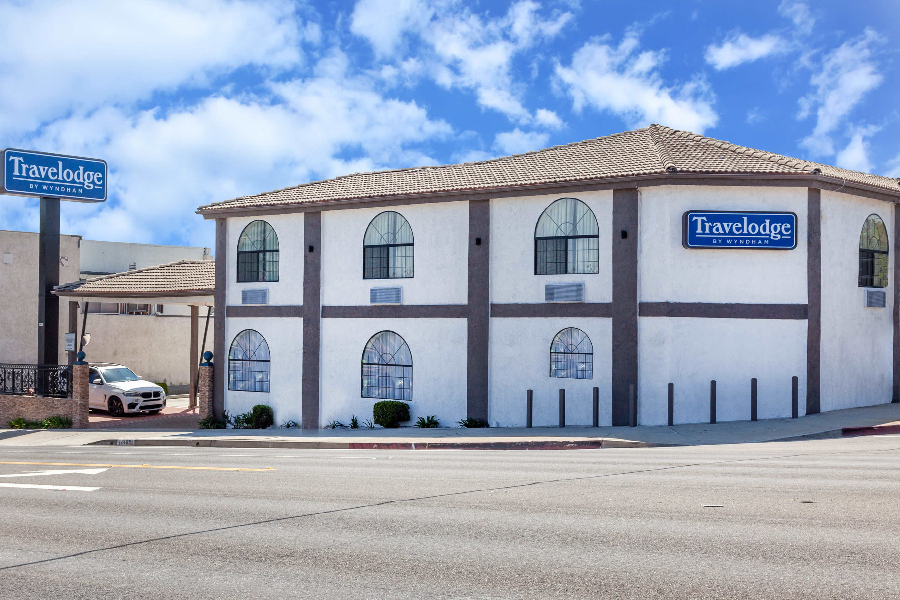Exterior Day Image of Travelodge by Wyndham Harbor City hotel in Harbor City, California