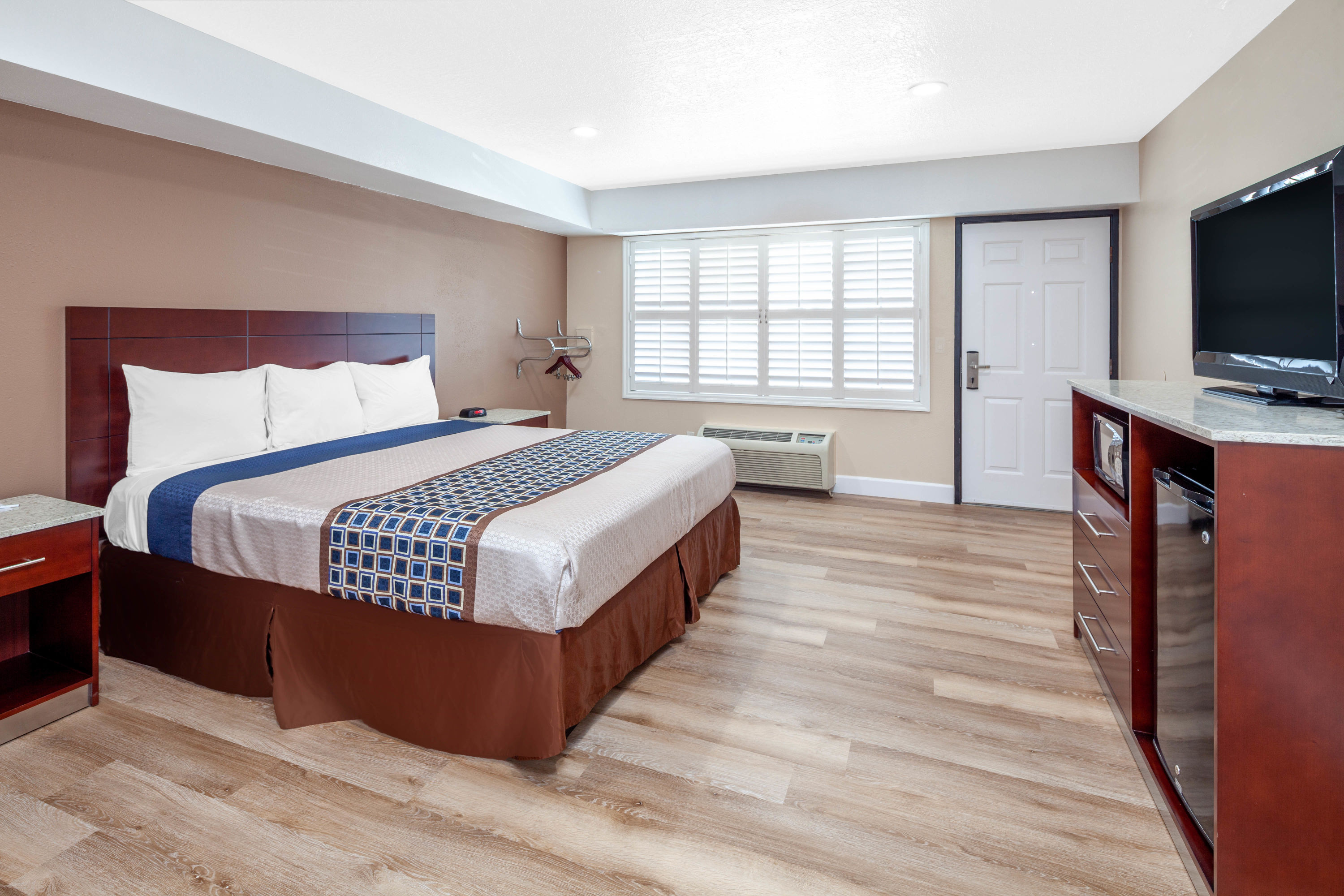 Guest room at the Travelodge by Wyndham Harbor City in Harbor City, California