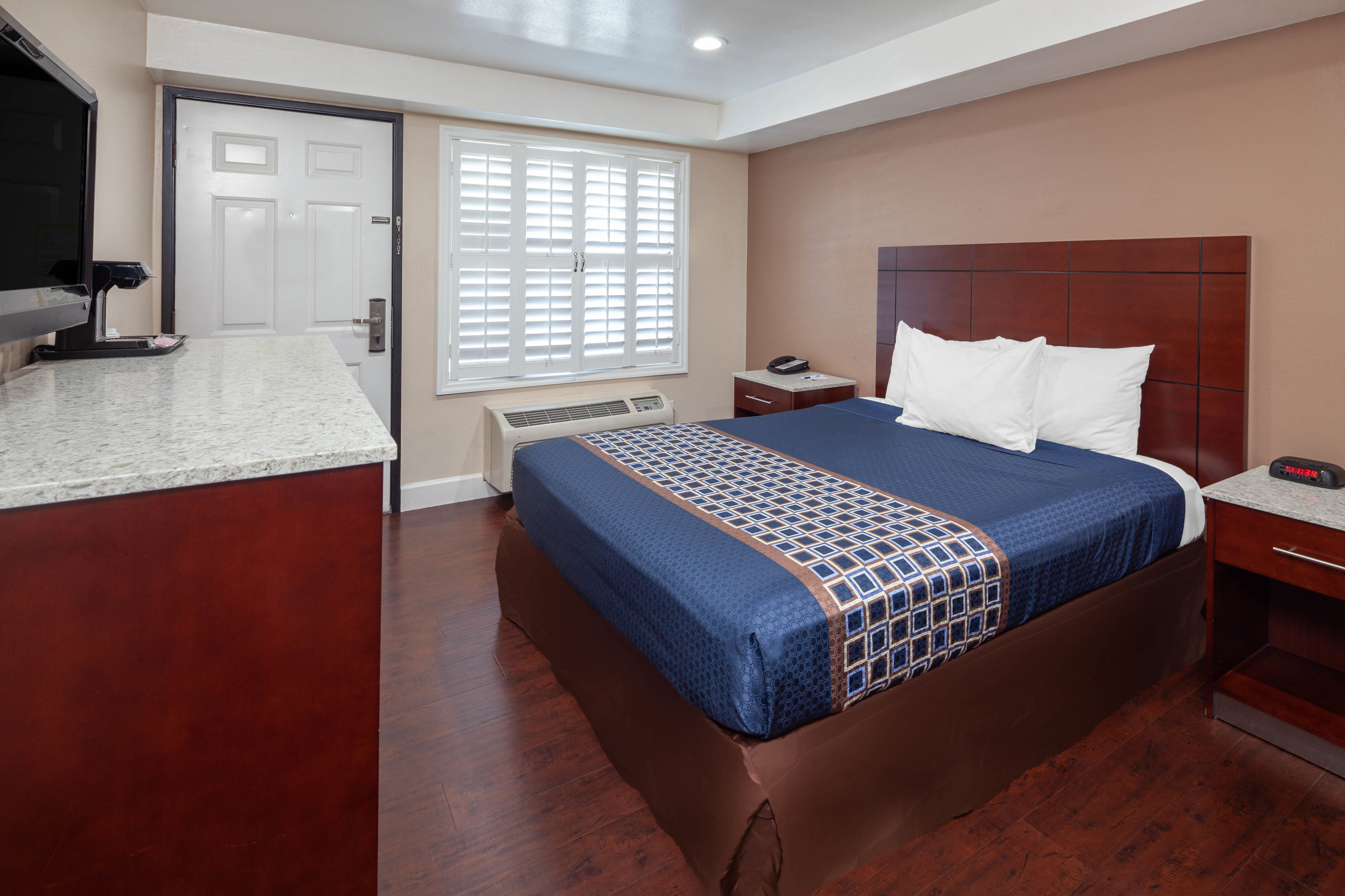 Guest room at the Travelodge by Wyndham Harbor City in Harbor City, California
