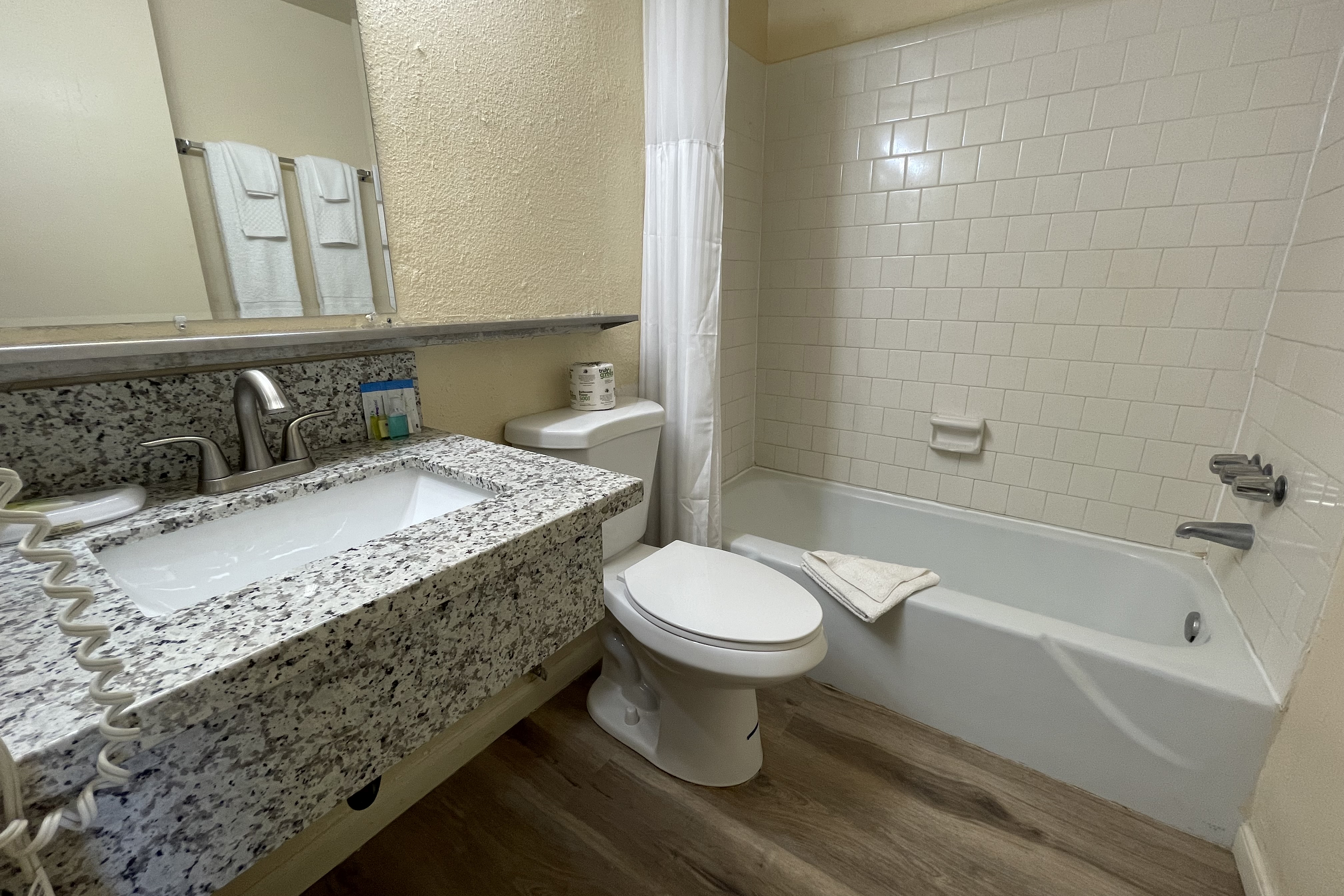 Guest room bath at the Travelodge by Wyndham Imperial/El Centro in Imperial, California