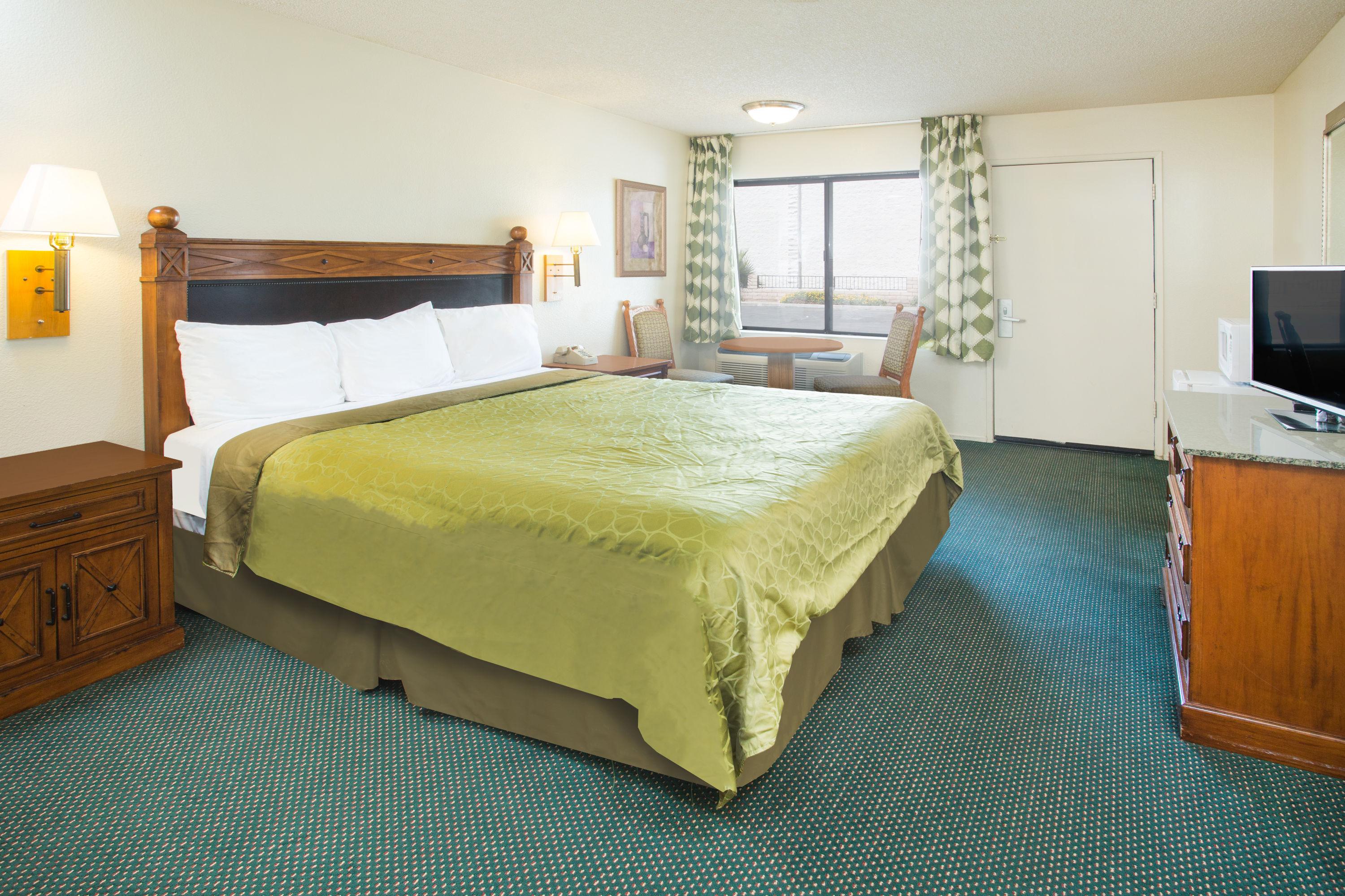 Guest room at the Travelodge by Wyndham Indio in Indio, California