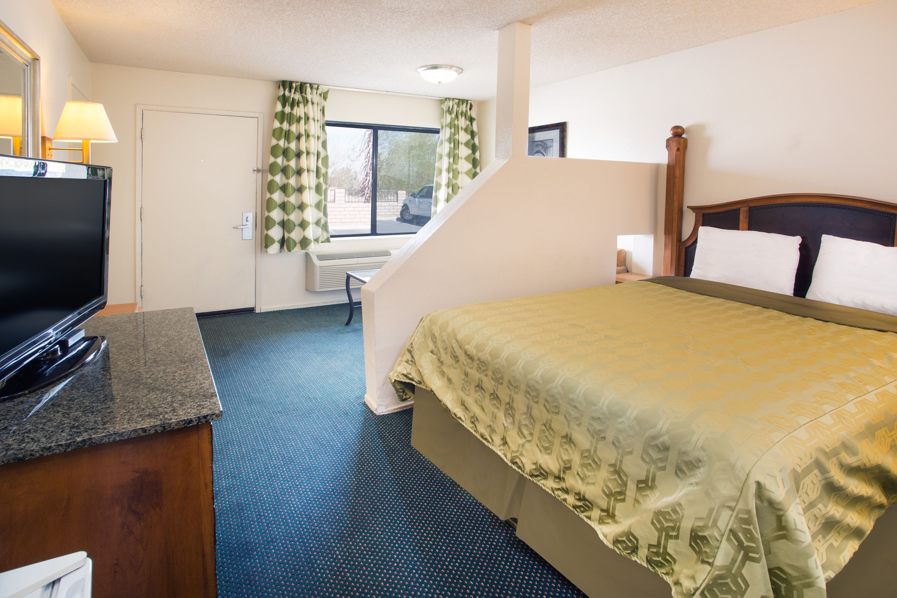 Guest room at the Travelodge by Wyndham Indio in Indio, California