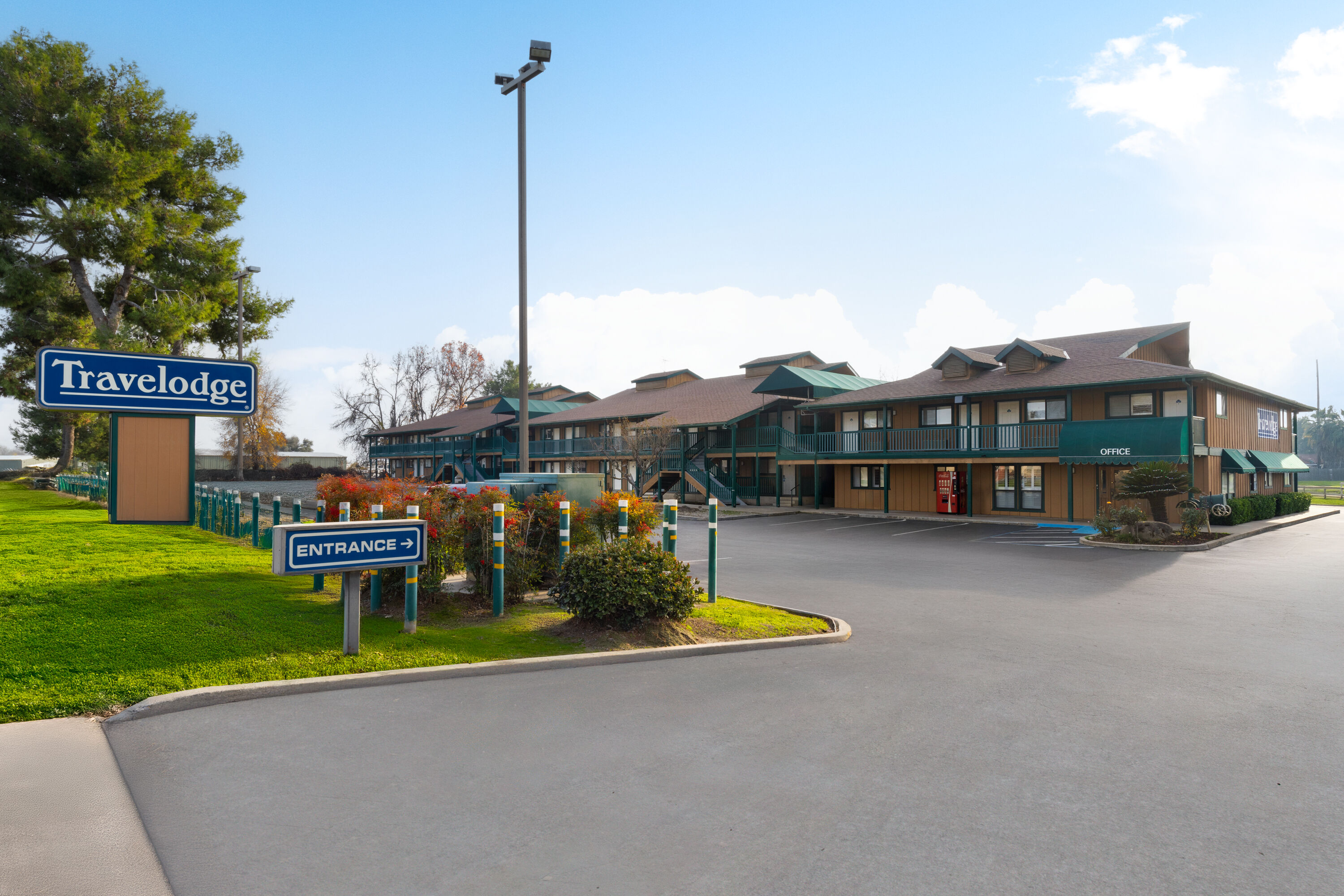Exterior Day Image of Travelodge by Wyndham Lemoore Near Naval Air Station hotel in Lemoore, California