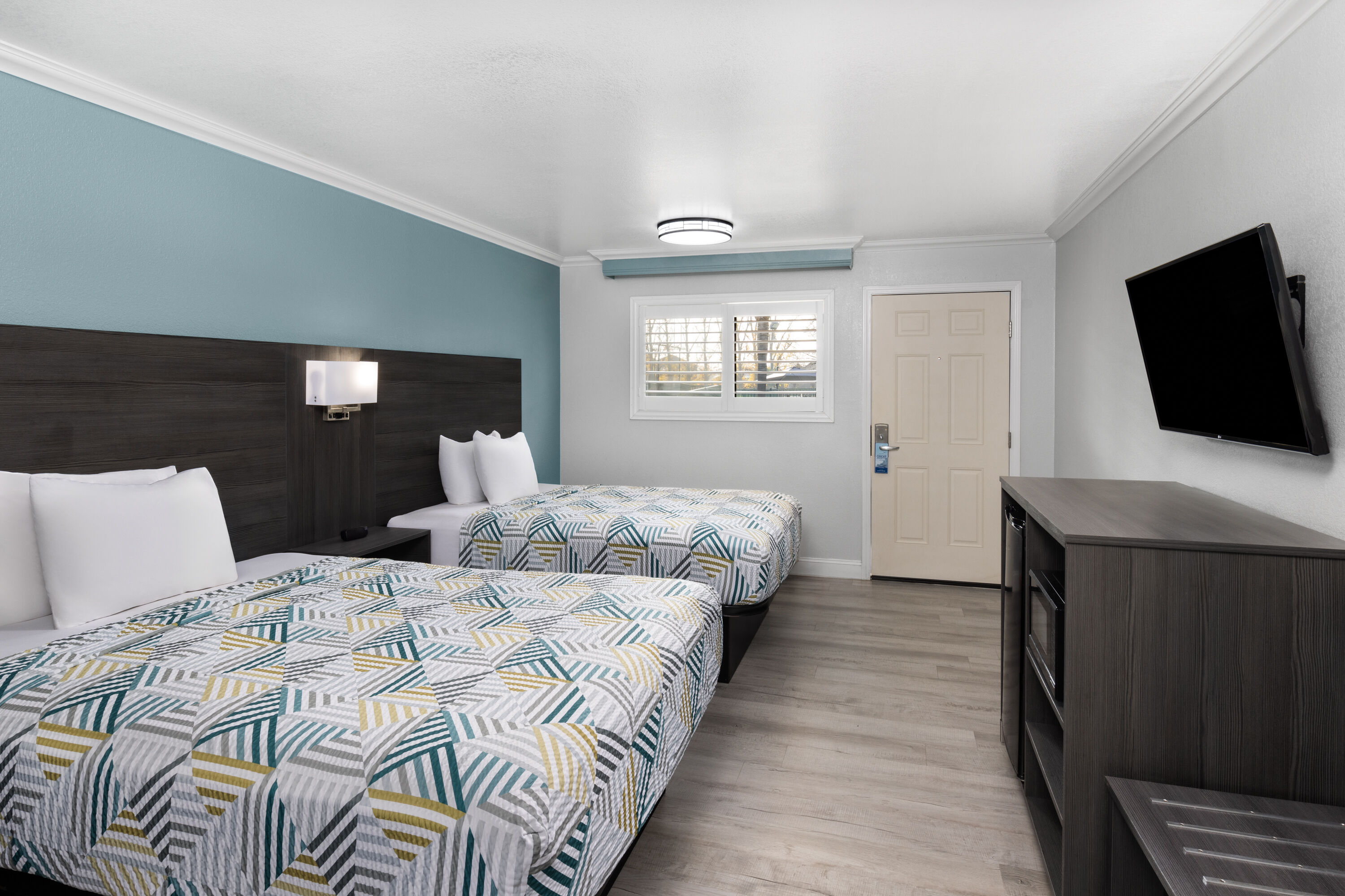 Guest room at the Travelodge by Wyndham Lemoore Near Naval Air Station in Lemoore, California