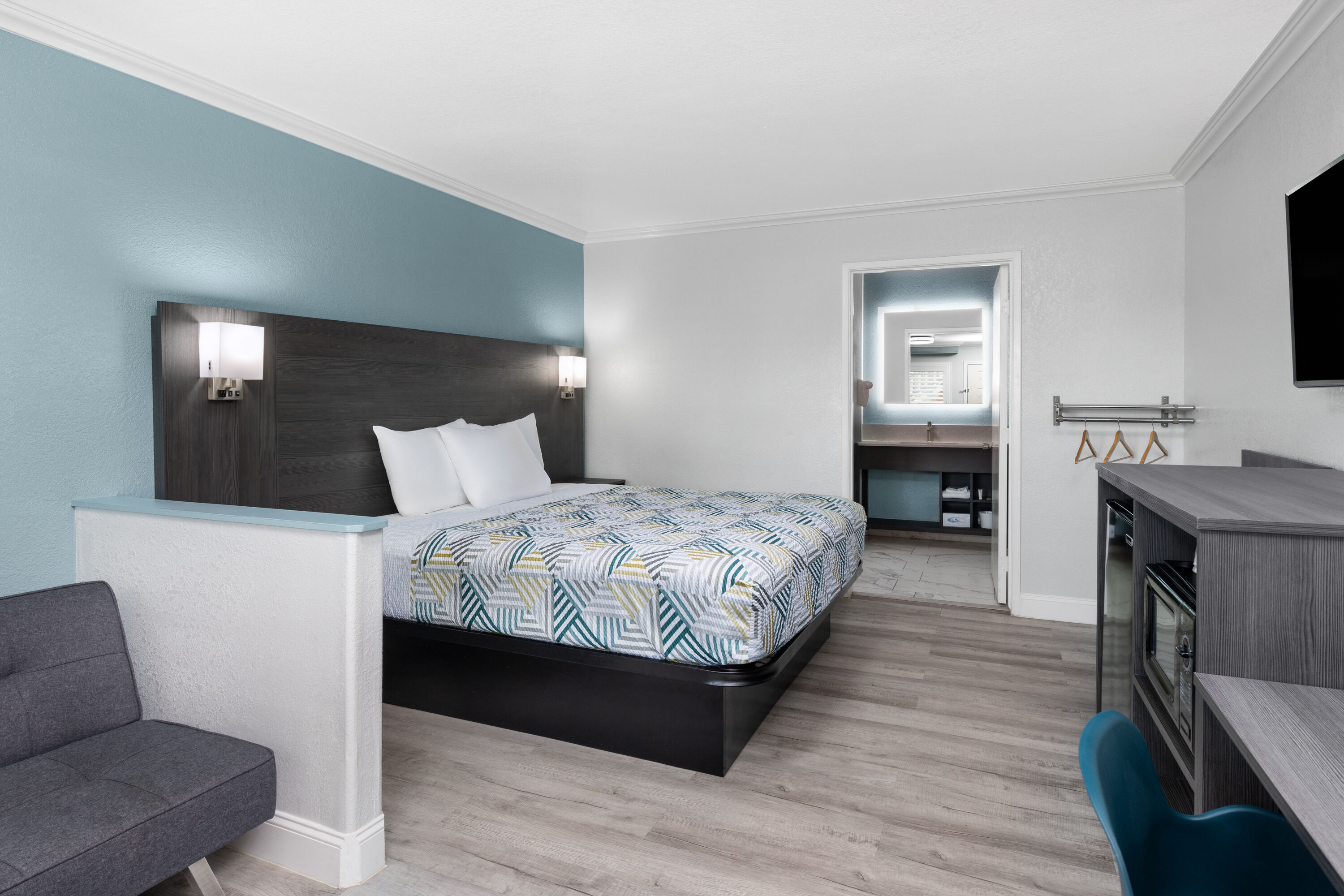 Guest room at the Travelodge by Wyndham Lemoore Near Naval Air Station in Lemoore, California