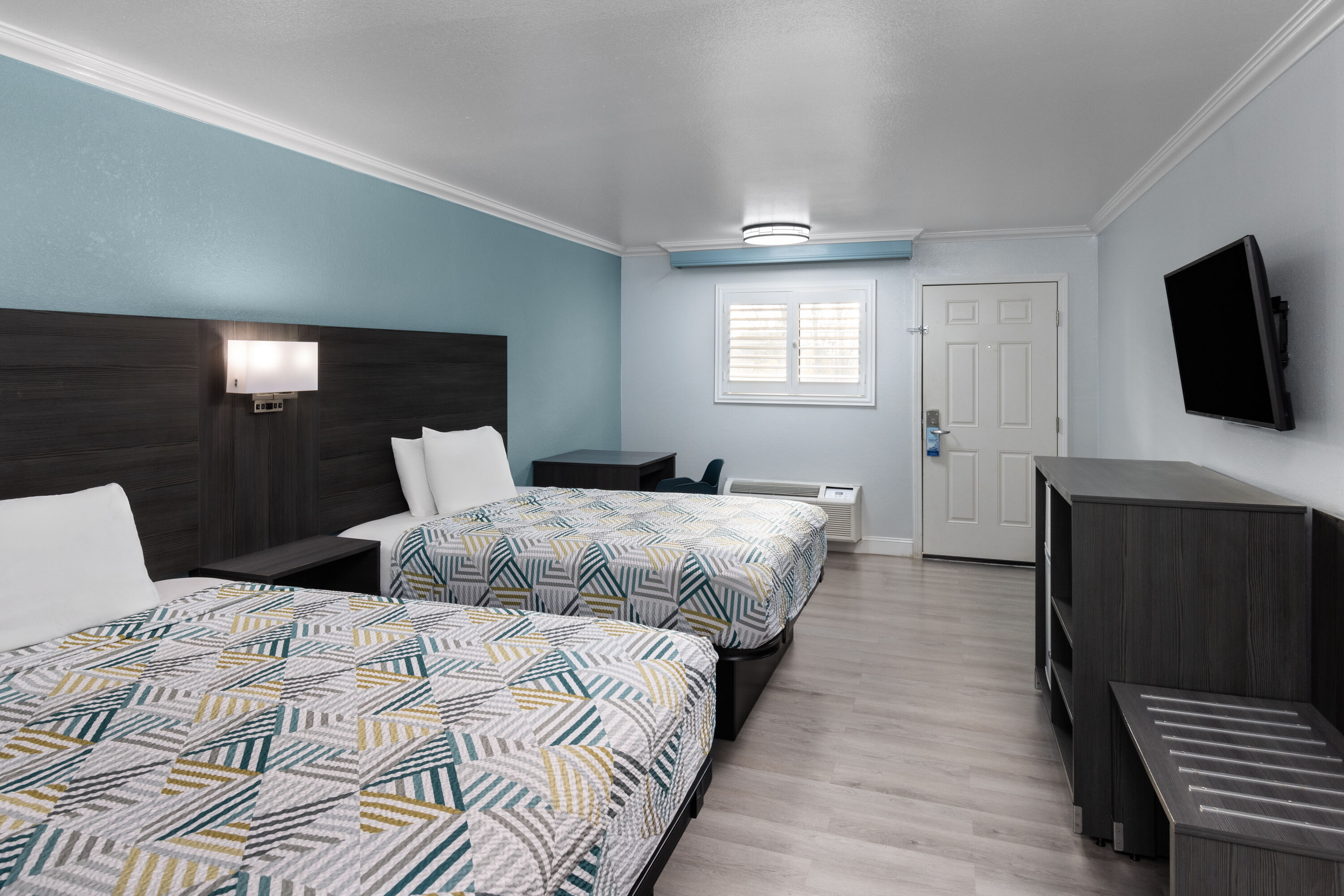 Guest room at the Travelodge by Wyndham Lemoore Near Naval Air Station in Lemoore, California