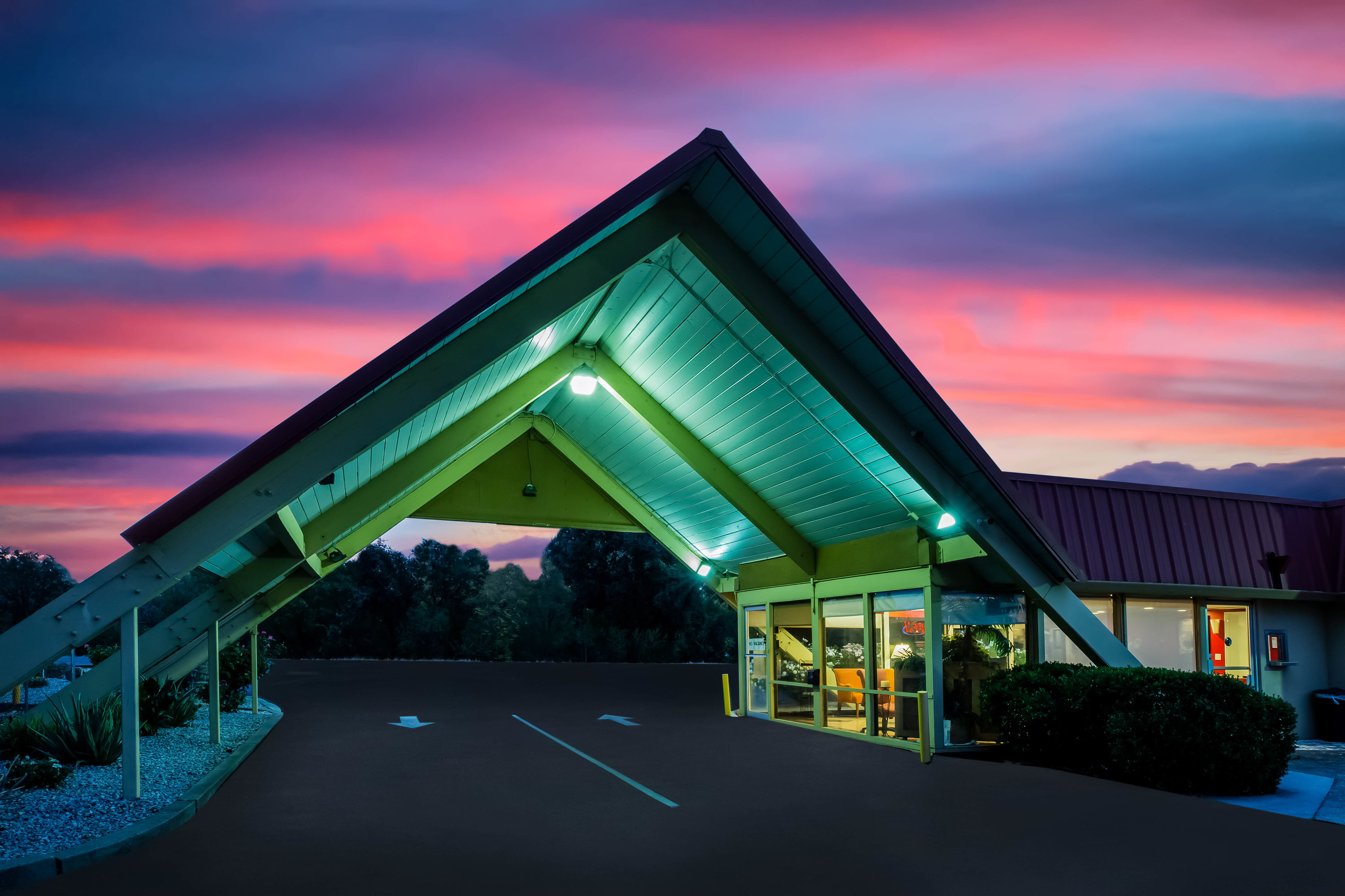 Exterior Night Image of Travelodge by Wyndham Red Bluff South of Redding hotel in Red Bluff, California