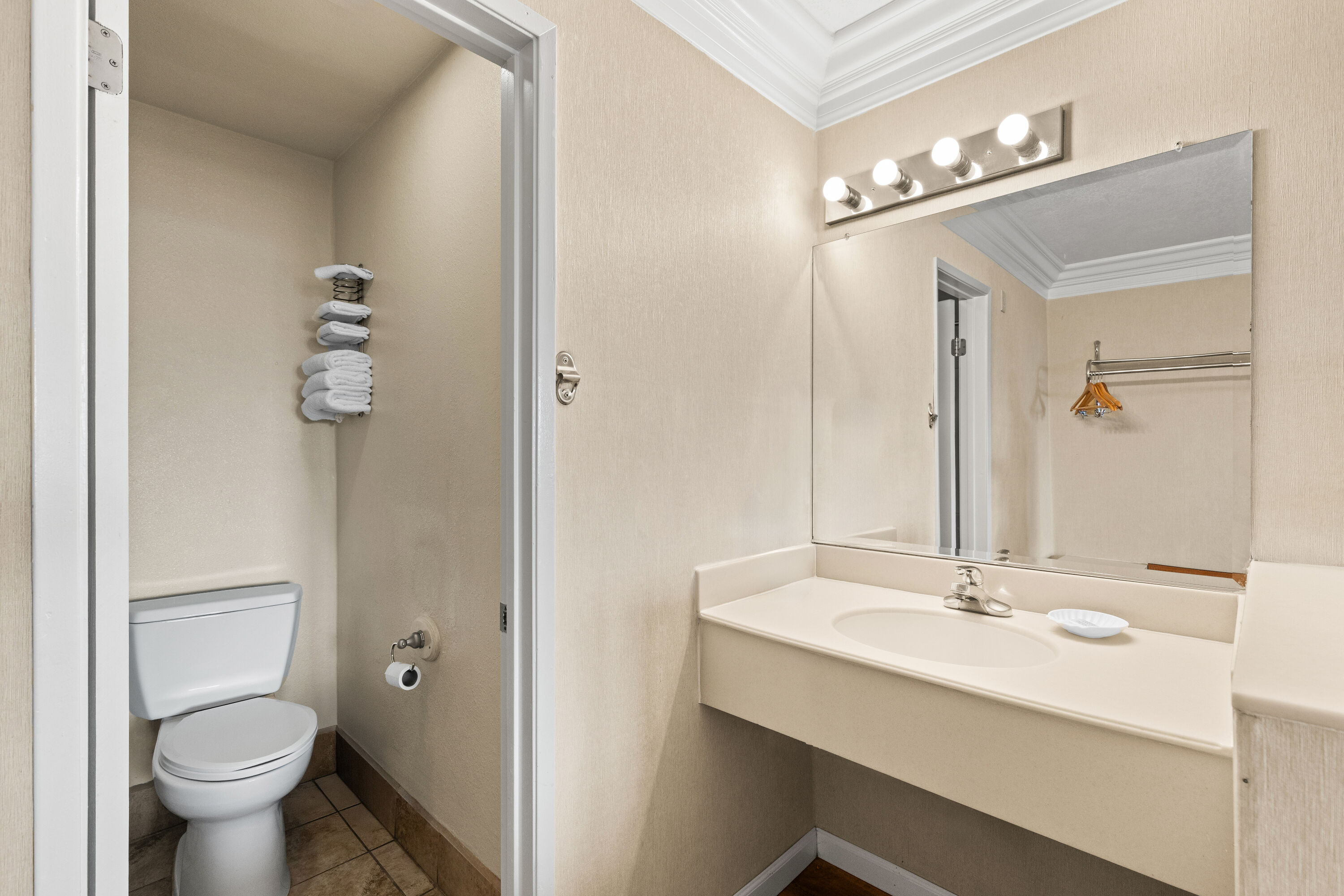 Guest room bath at the Travelodge by Wyndham San Clemente Beach in San Clemente, California