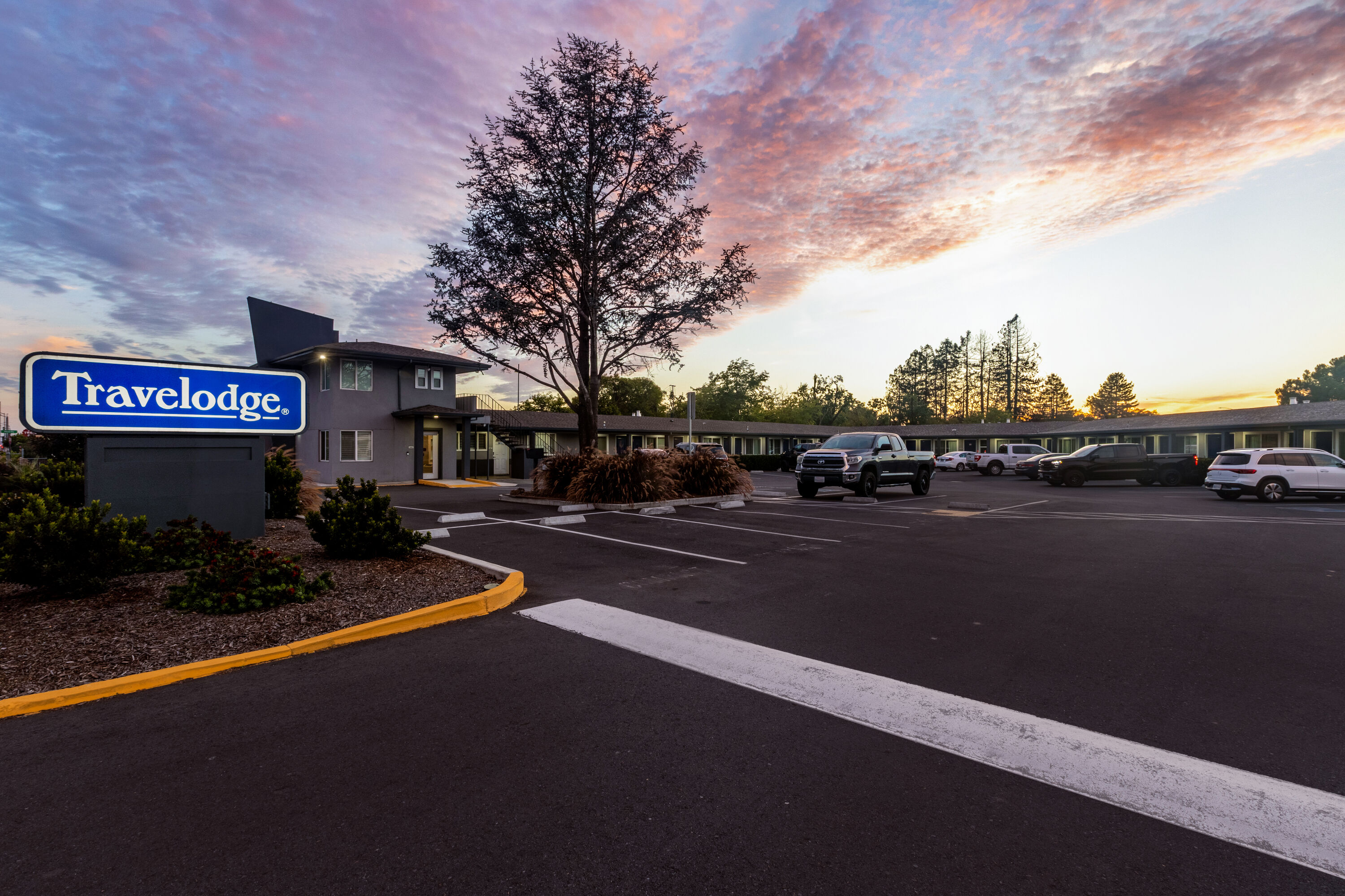 Exterior Night Image of Travelodge by Wyndham Santa Rosa Wine Country hotel in Santa Rosa, California