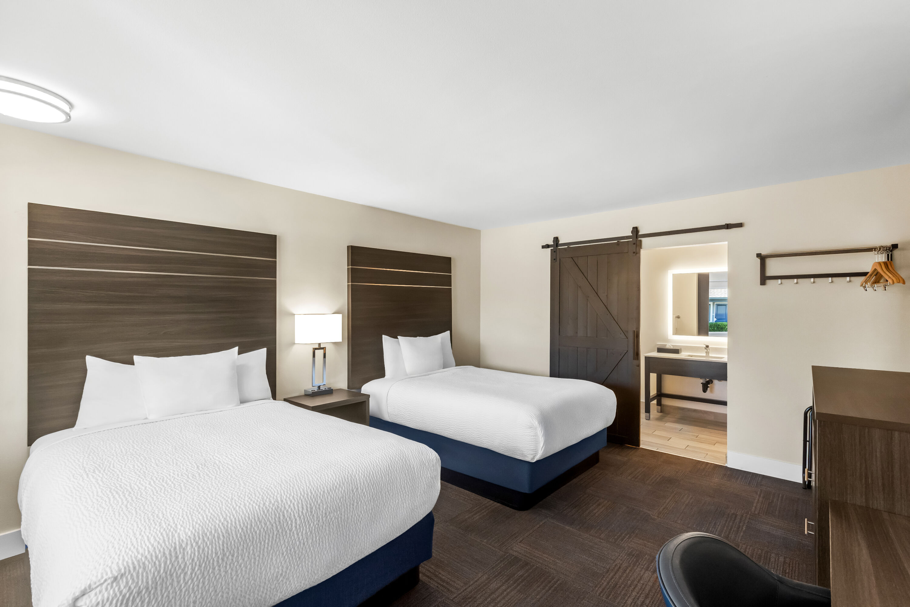 Double bed guest room at the Travelodge by Wyndham Santa Rosa Wine Country in Santa Rosa, California