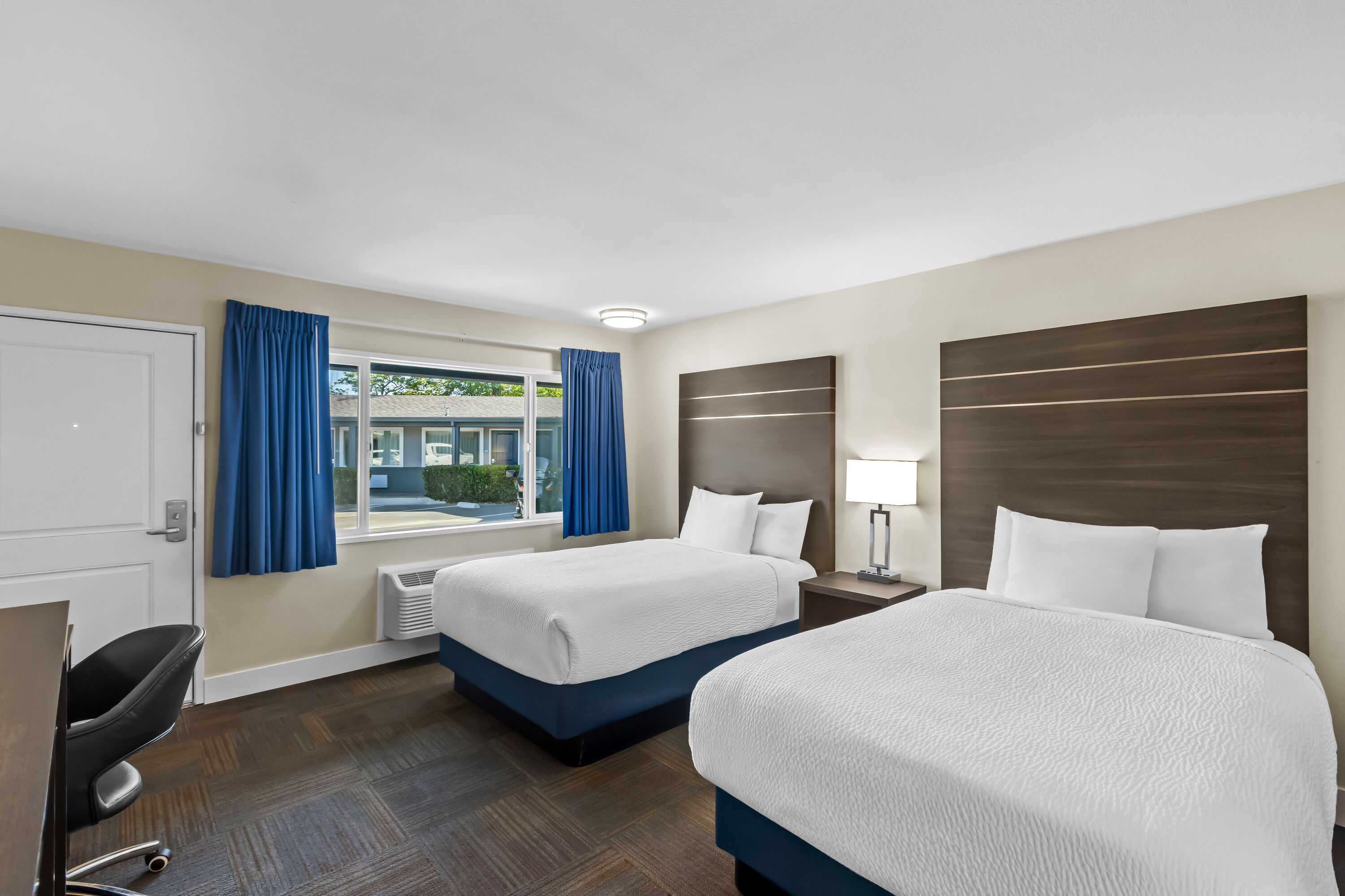 Double bed guest room at the Travelodge by Wyndham Santa Rosa Wine Country in Santa Rosa, California