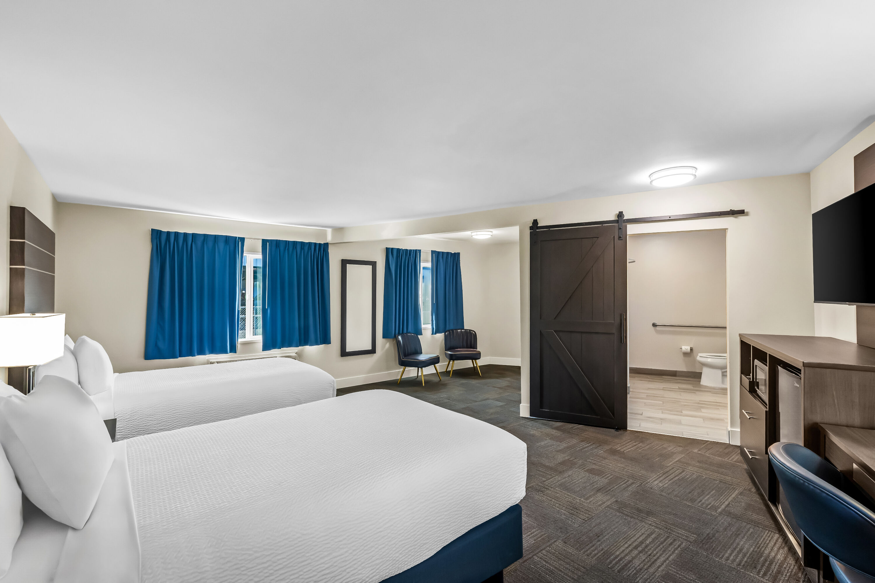 Double bed guest room at the Travelodge by Wyndham Santa Rosa Wine Country in Santa Rosa, California