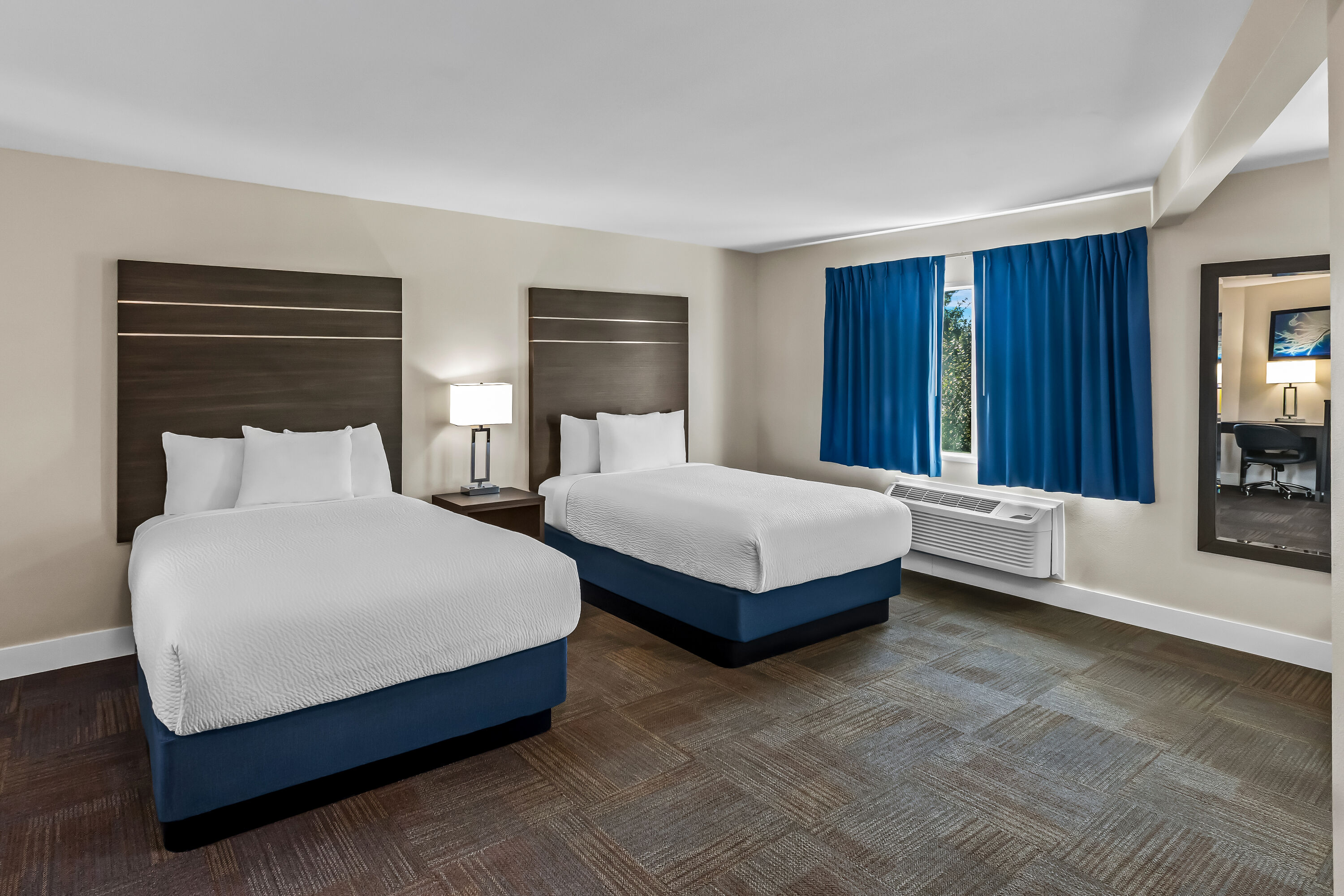 Double bed guest room at the Travelodge by Wyndham Santa Rosa Wine Country in Santa Rosa, California