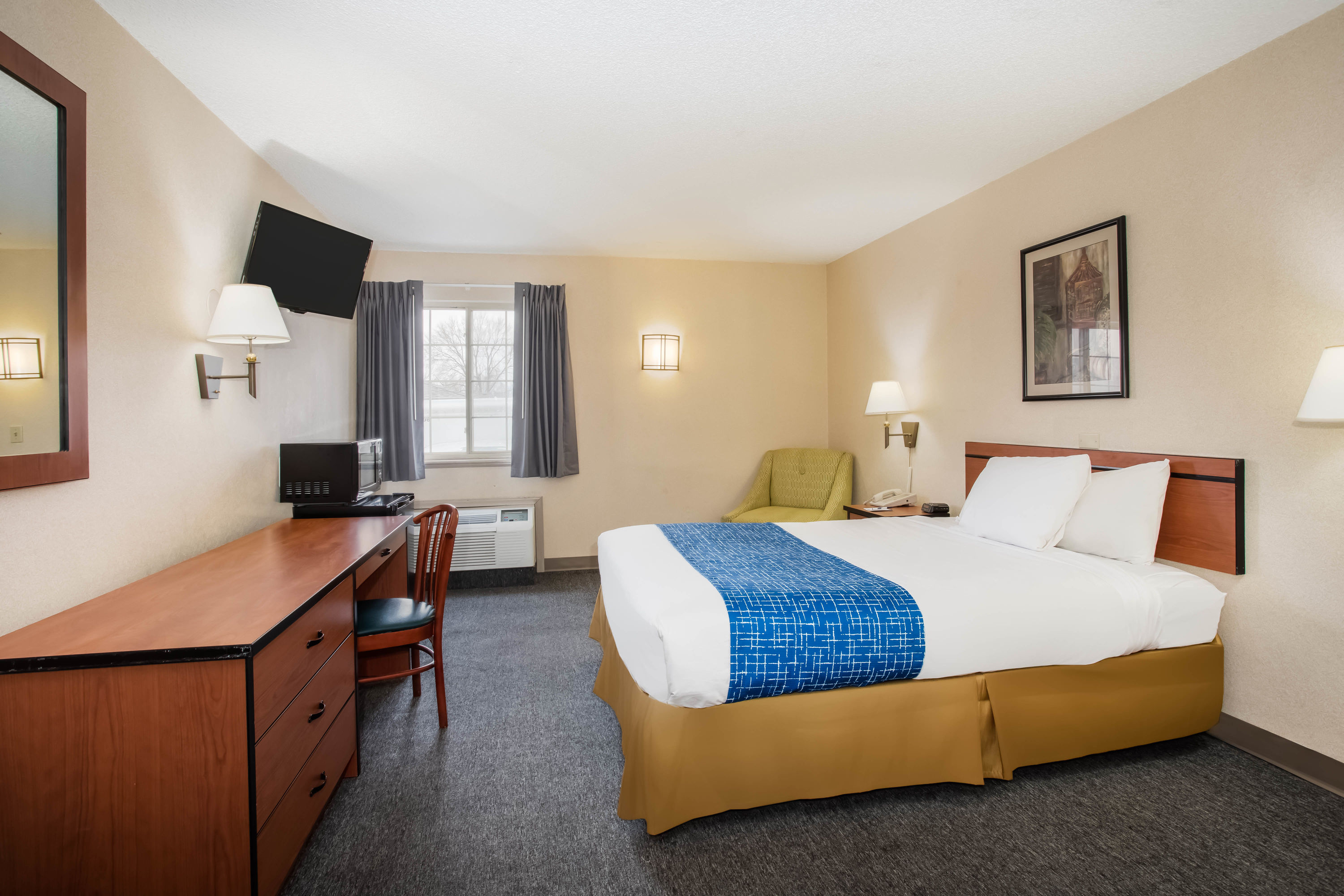 Guest room at the Travelodge by Wyndham Colorado Springs Airport/Peterson SFB in Colorado Springs, Colorado