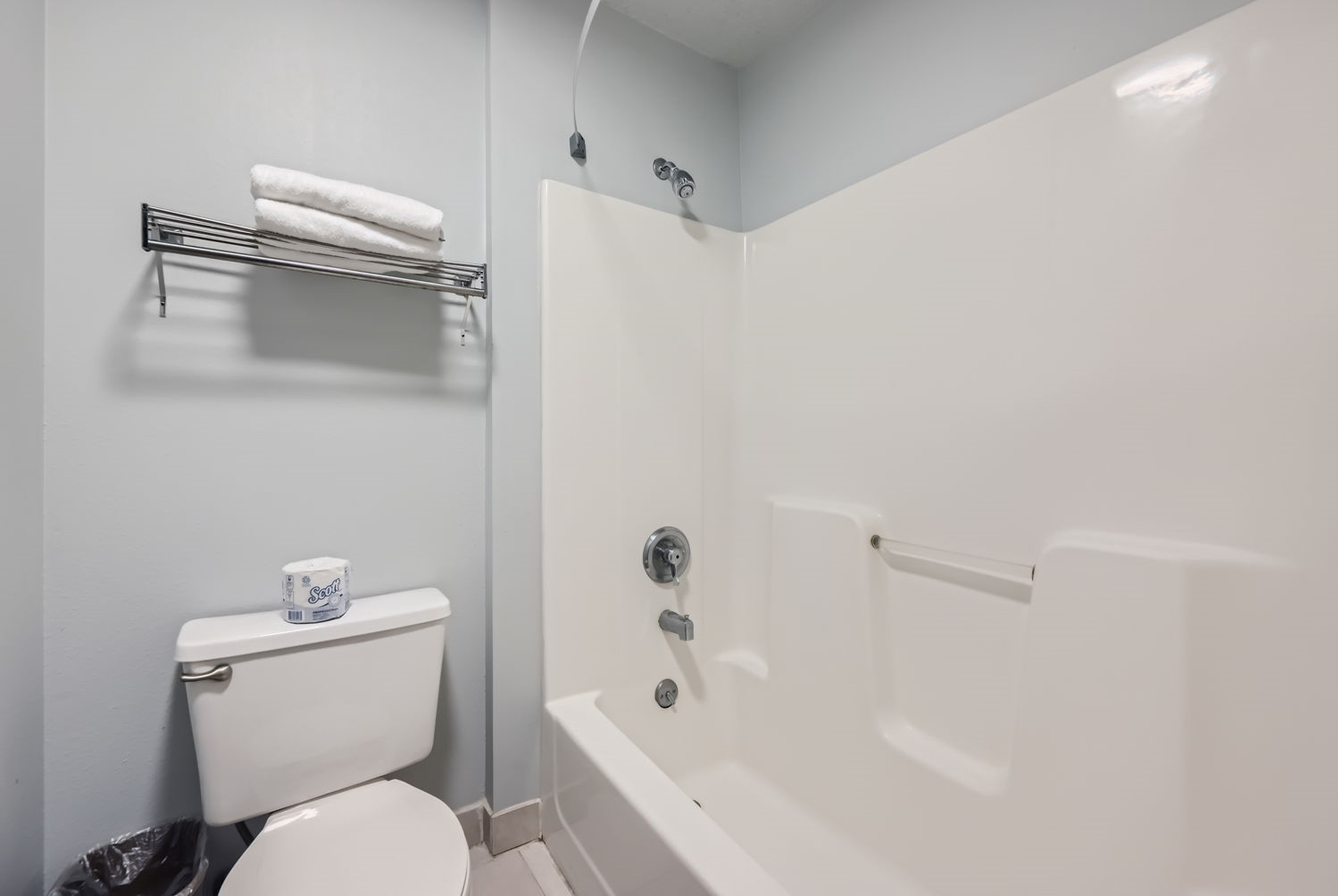 Guest room bath at the Travelodge by Wyndham Longmont in Longmont, Colorado