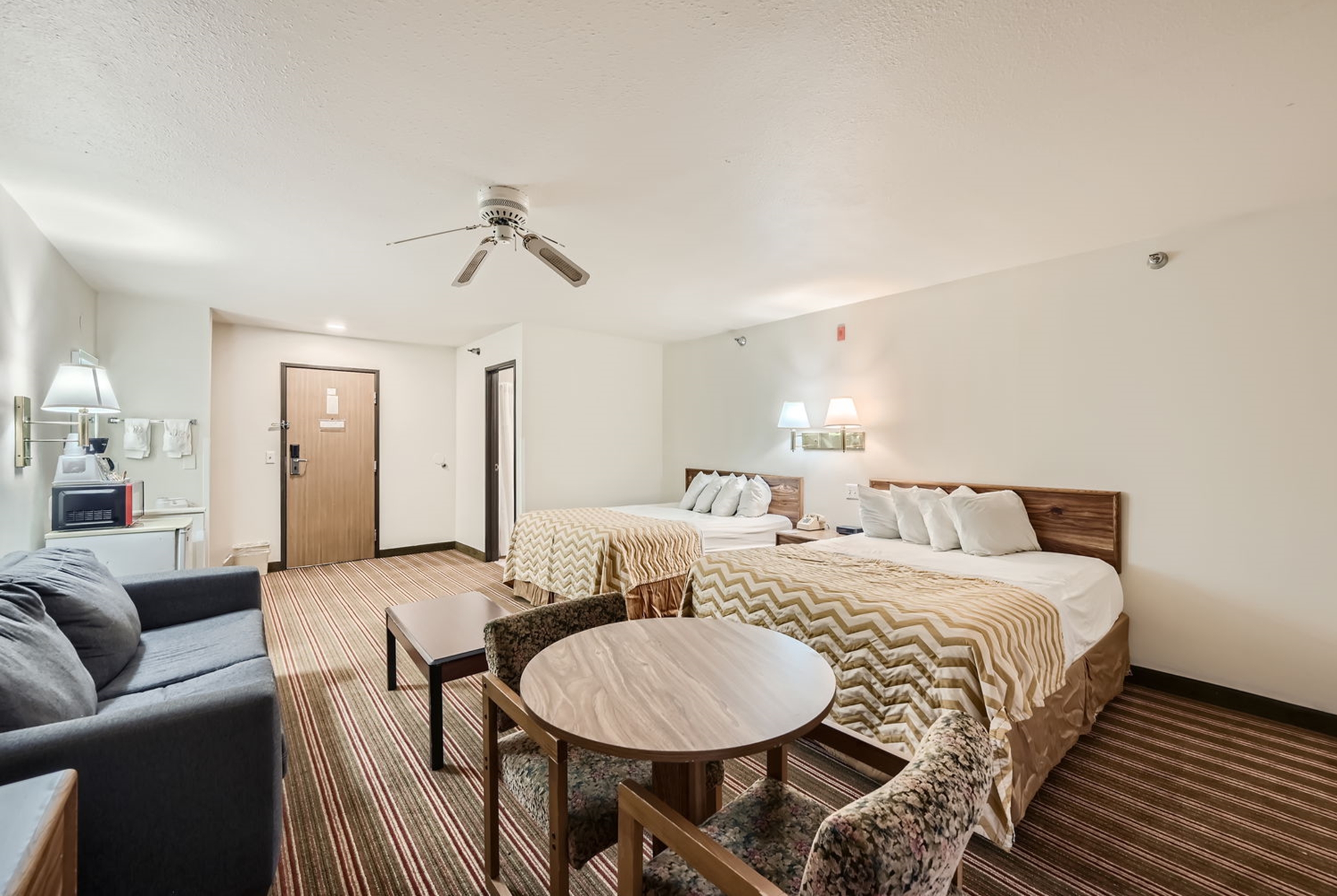 Guest room at the Travelodge by Wyndham Longmont in Longmont, Colorado