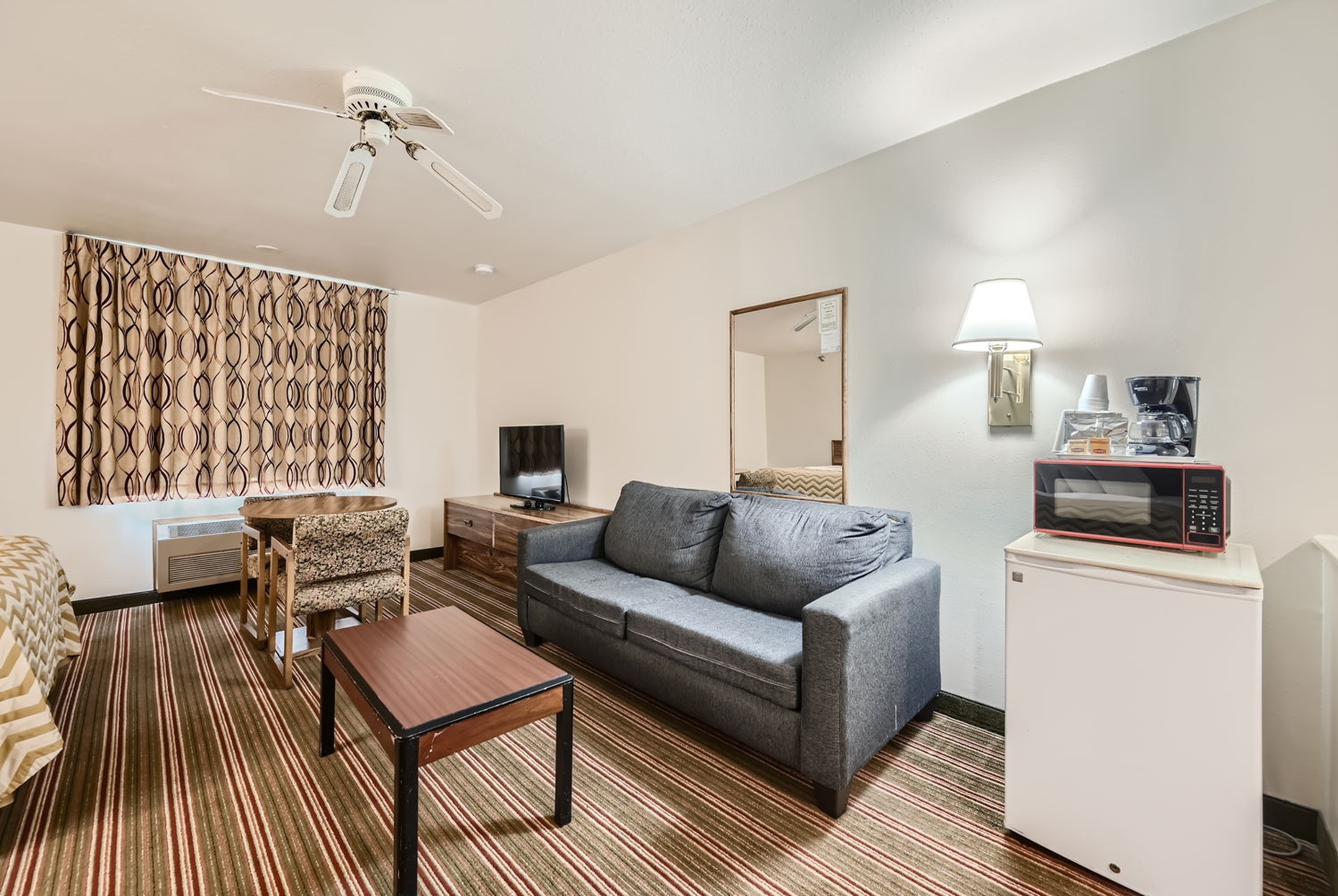 Guest room at the Travelodge by Wyndham Longmont in Longmont, Colorado