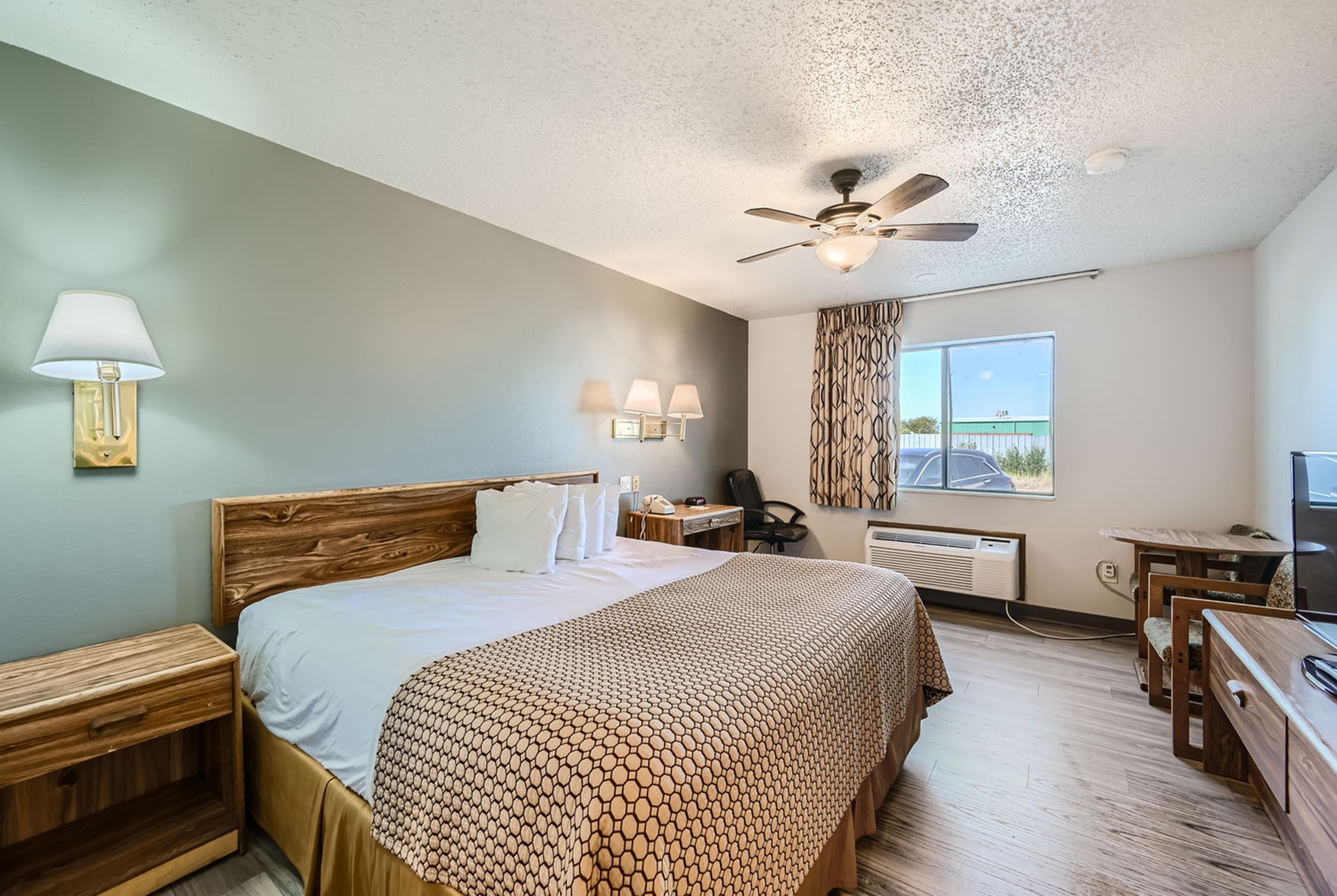 Guest room at the Travelodge by Wyndham Longmont in Longmont, Colorado