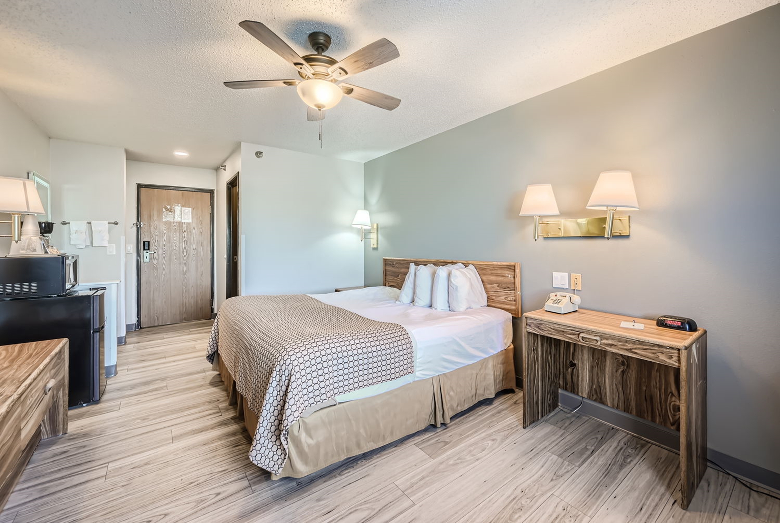 Guest room at the Travelodge by Wyndham Longmont in Longmont, Colorado