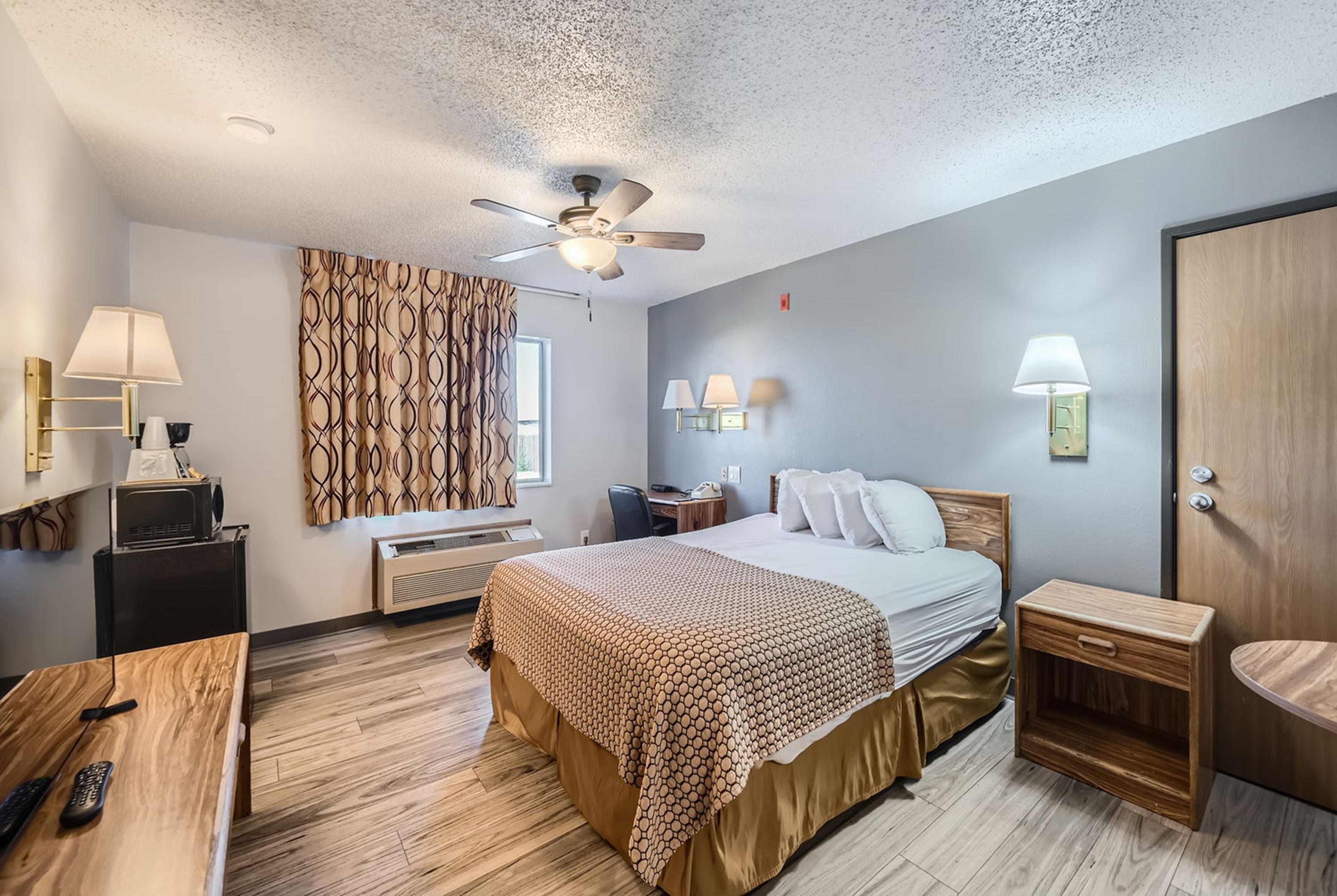 Guest room at the Travelodge by Wyndham Longmont in Longmont, Colorado