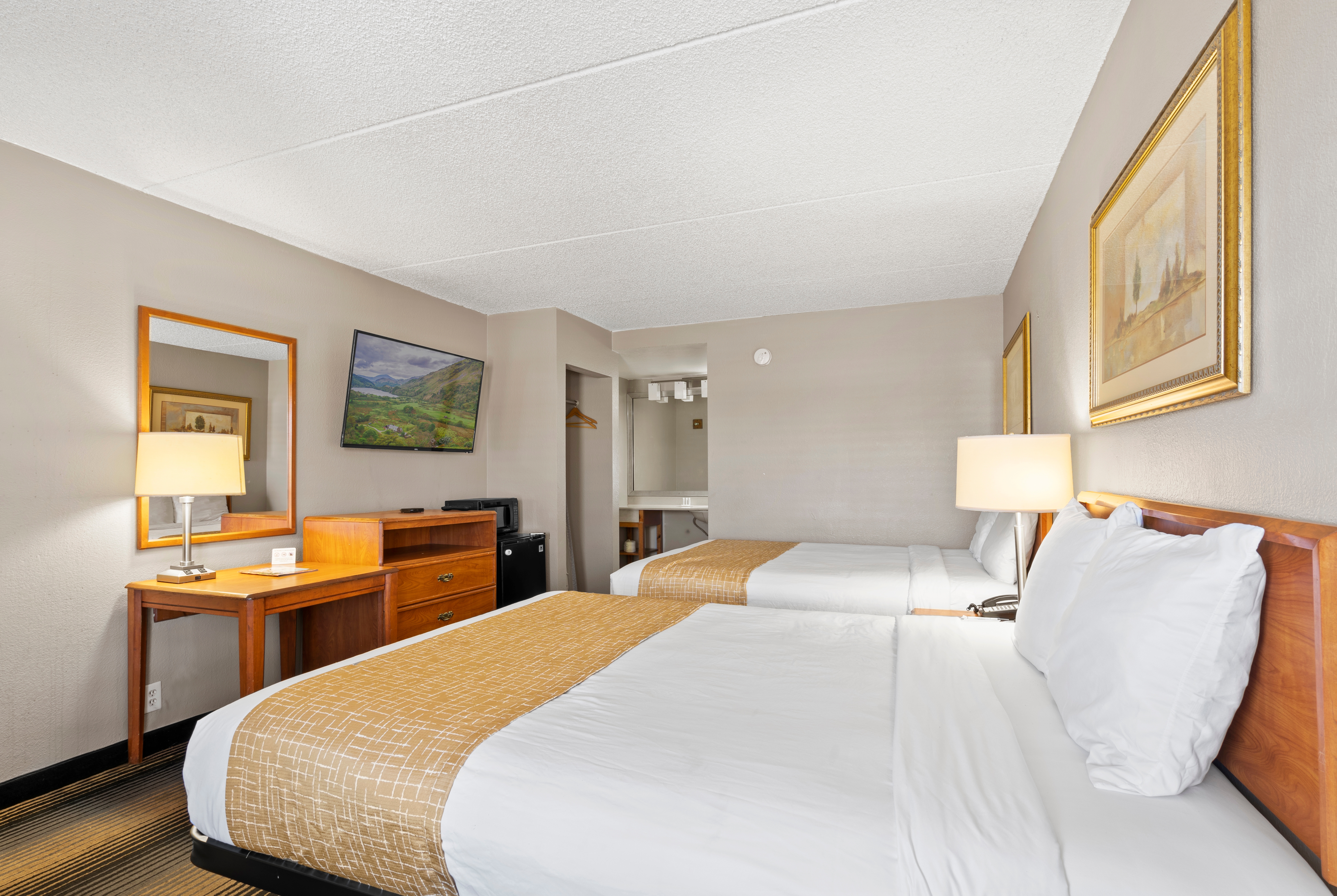 Guest room at the Travelodge by Wyndham Pueblo in Pueblo, Colorado