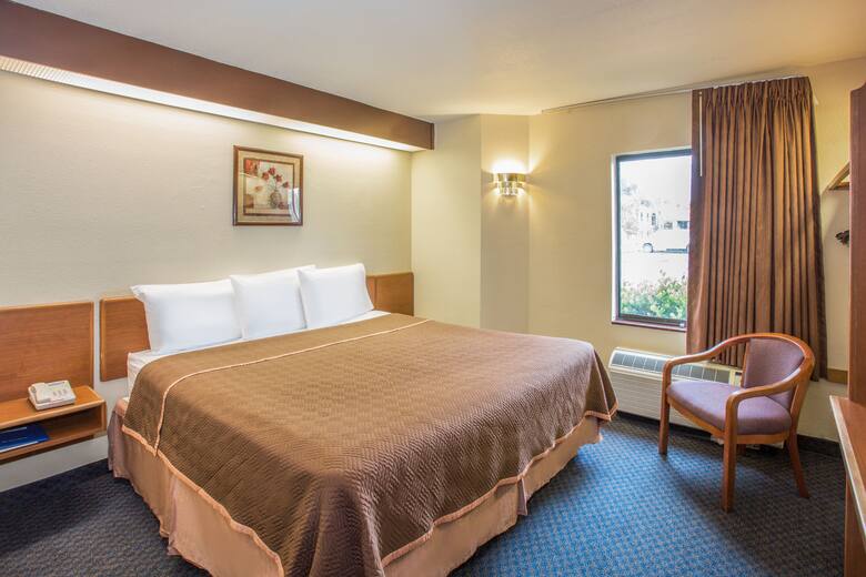 Guest room at the Travelodge Fort Myers Airport in Fort Myers, Florida